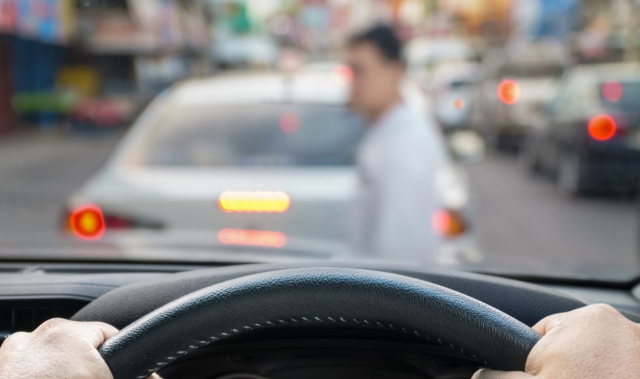 car emergency brake saved a life pesdestrian runs across street.