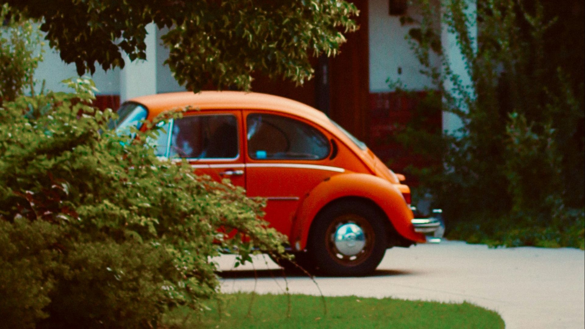 a car parked in front of a house