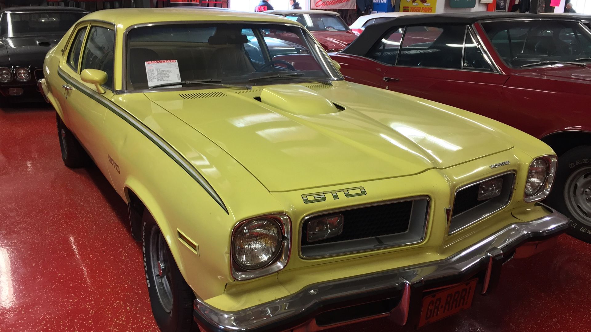 Front right side view of a 1974 Pontiac Ventura with GTO option - this car is in factory original condition finished in yellow