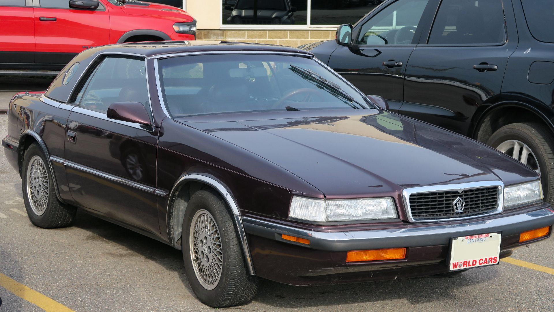1989 Chrysler TC by Maserati photographed in Sault Ste. Marie, Ontario, Canada. Being a first year example, it's equipped with a Chrysler-developed 2.2L Turbo II 4-cylinder and a 3-speed automatic transmission, and final assembly took place in in Milan, I