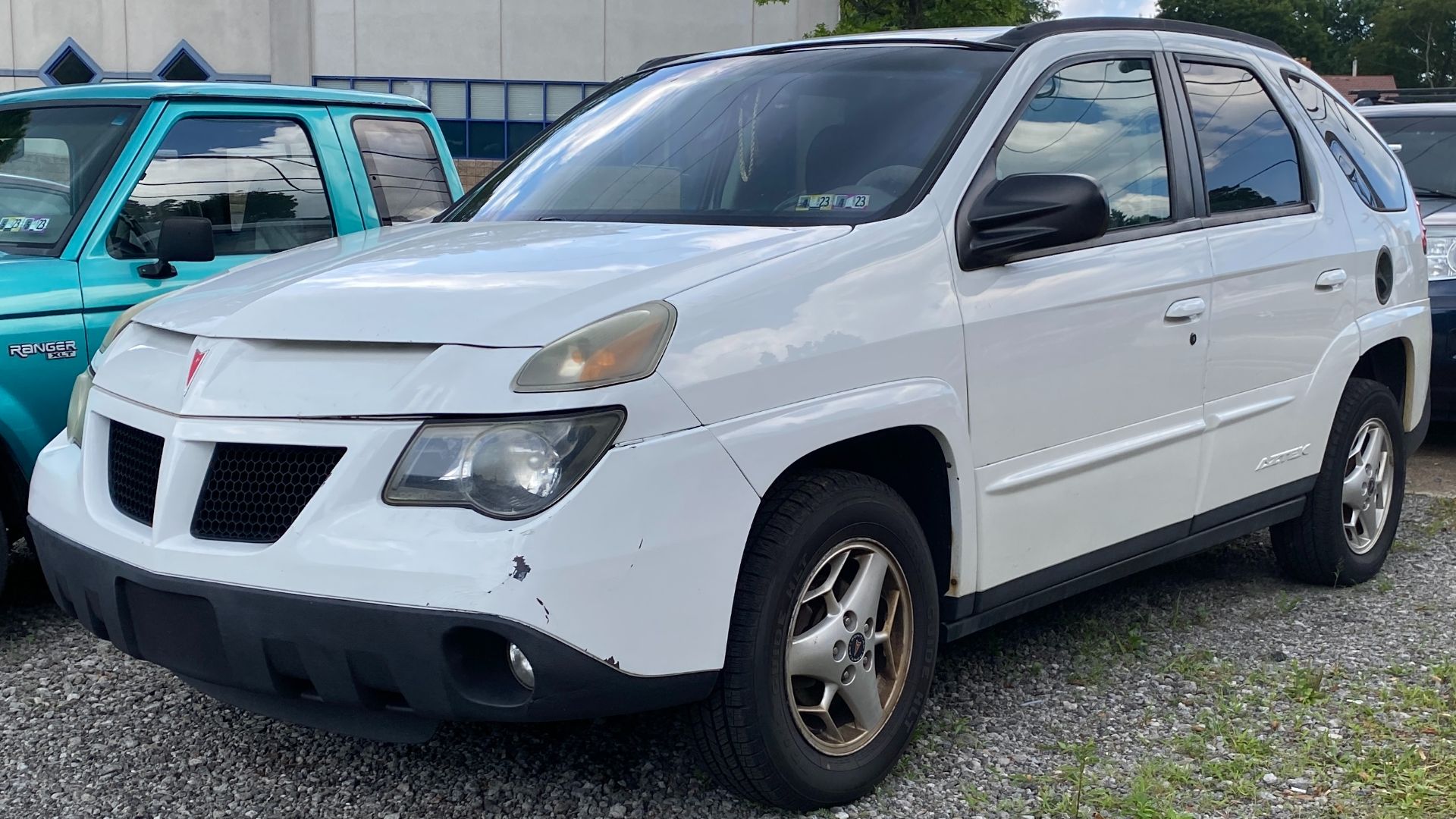 2004 Pontiac Aztek FWD photographed in Mt. Lebanon, Pennsylvania. This Aztek is equipped with the 3.4L V6 engine, and assembled in Ramoz Arizpe, Mexico. This year Aztek also happened to be the one famously featured in Breaking Bad, though the Aztek was Na
