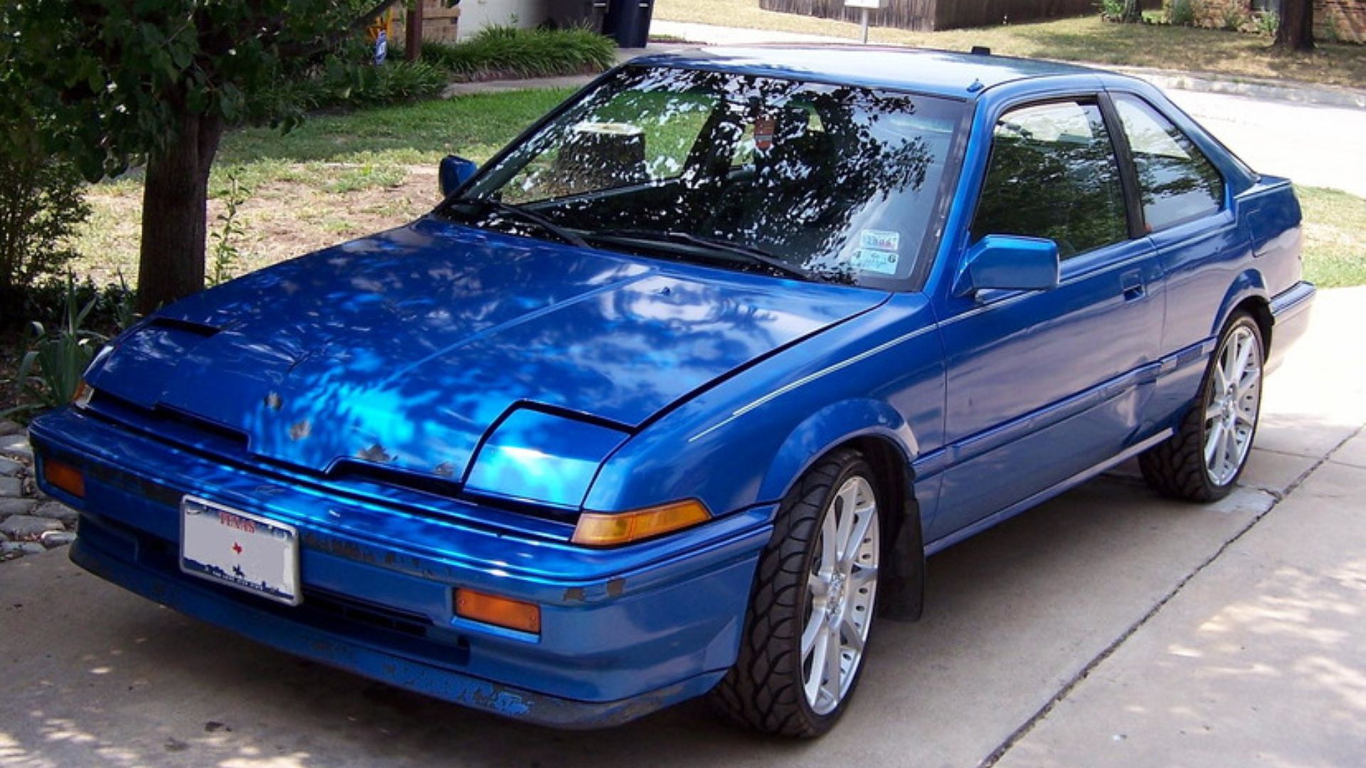 1987 Acura Integra, better-than-typical example but with aftermarket wheels.