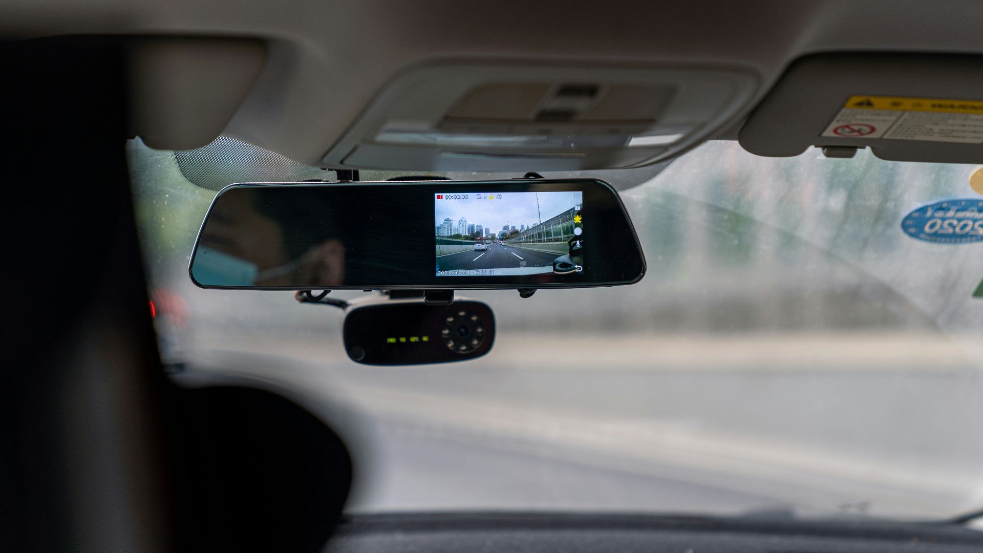 car side mirror with water droplets