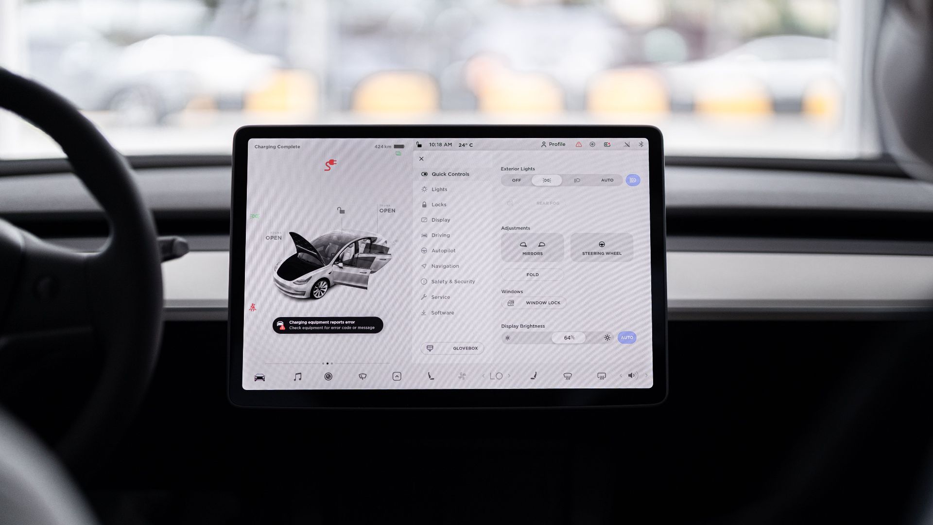 View of a modern car's dashboard featuring a digital display panel with control options.