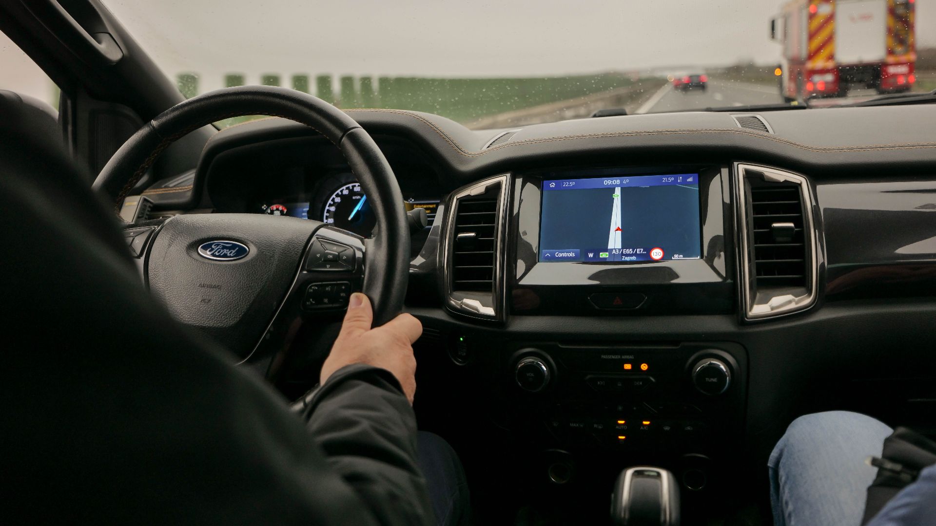 Interior view of driving a Ford with navigation system on a highway near Zagreb, Croatia.