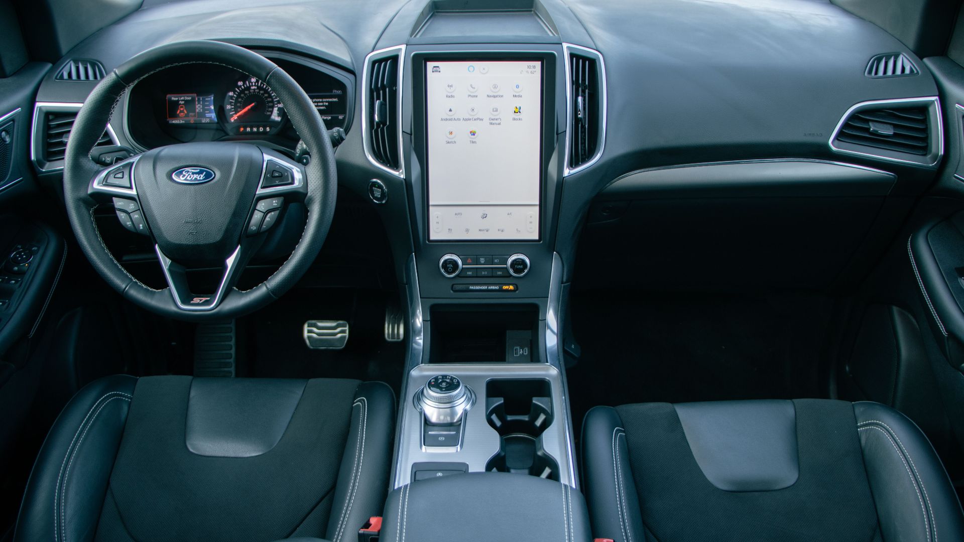 Modern Ford car interior showcasing the sleek dashboard and controls.