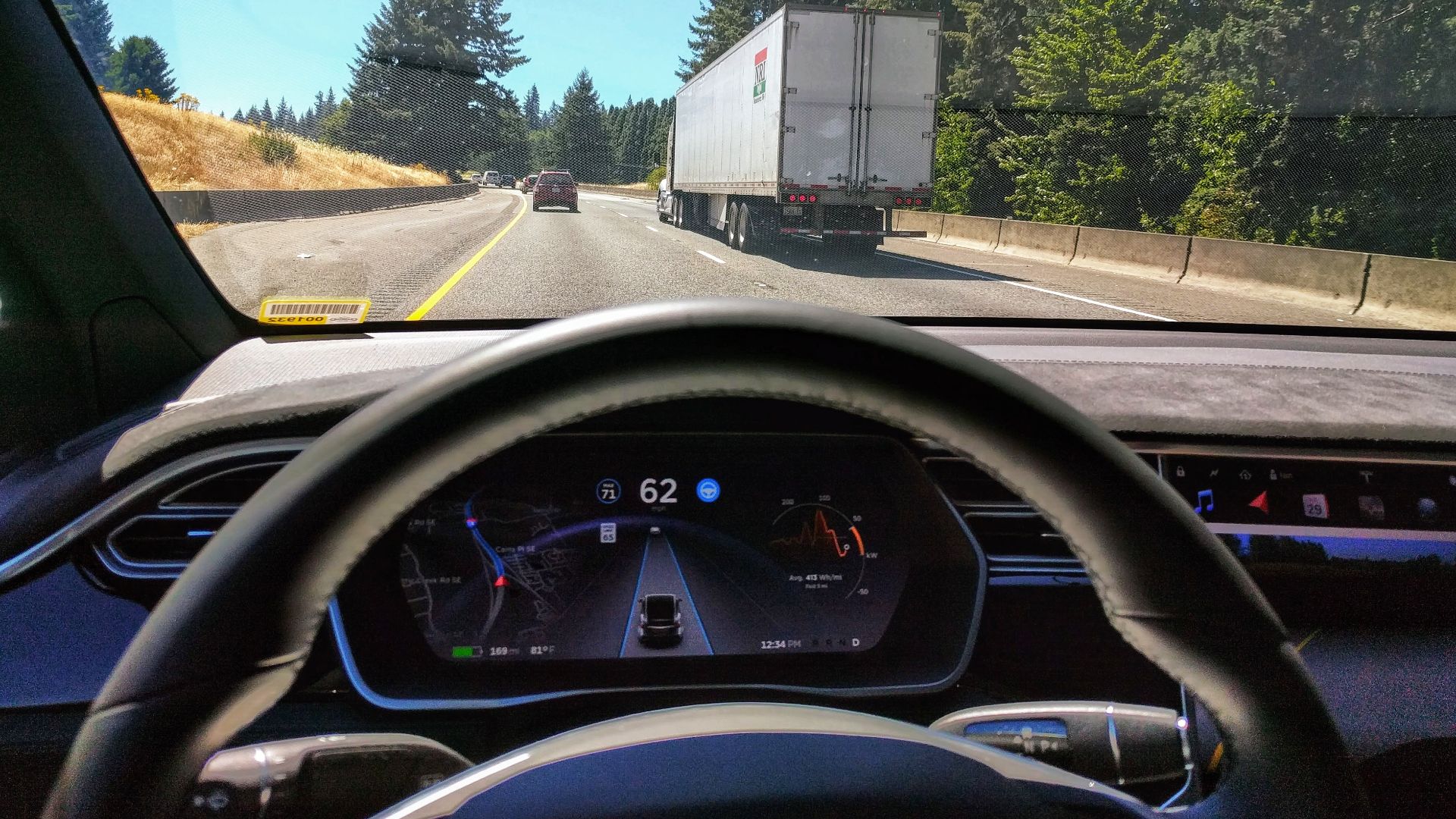 Driving in traffic with Tesla's autopilot controlling distance from the lead car and centering the vehicle in the lane.
Vehicle is a 2017 Model X 75D with dark interior.