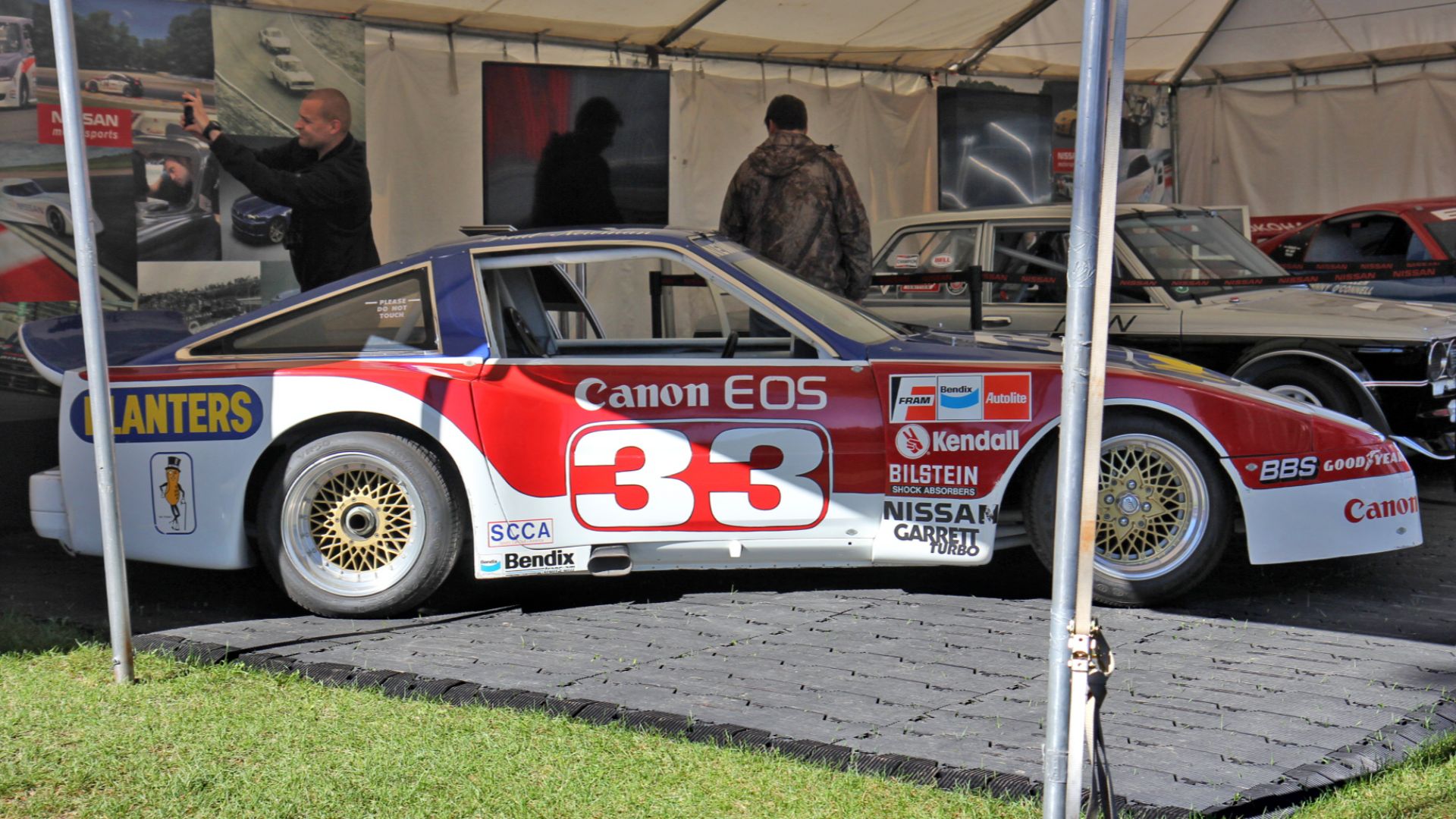 A w:Paul Newman Nissan race car on display at w:Road America during the 2013 SCCA National Runoffs. This image has been uploaded to my flickr account at https://www.flickr.com/photos/royal_broil/10954463935 .