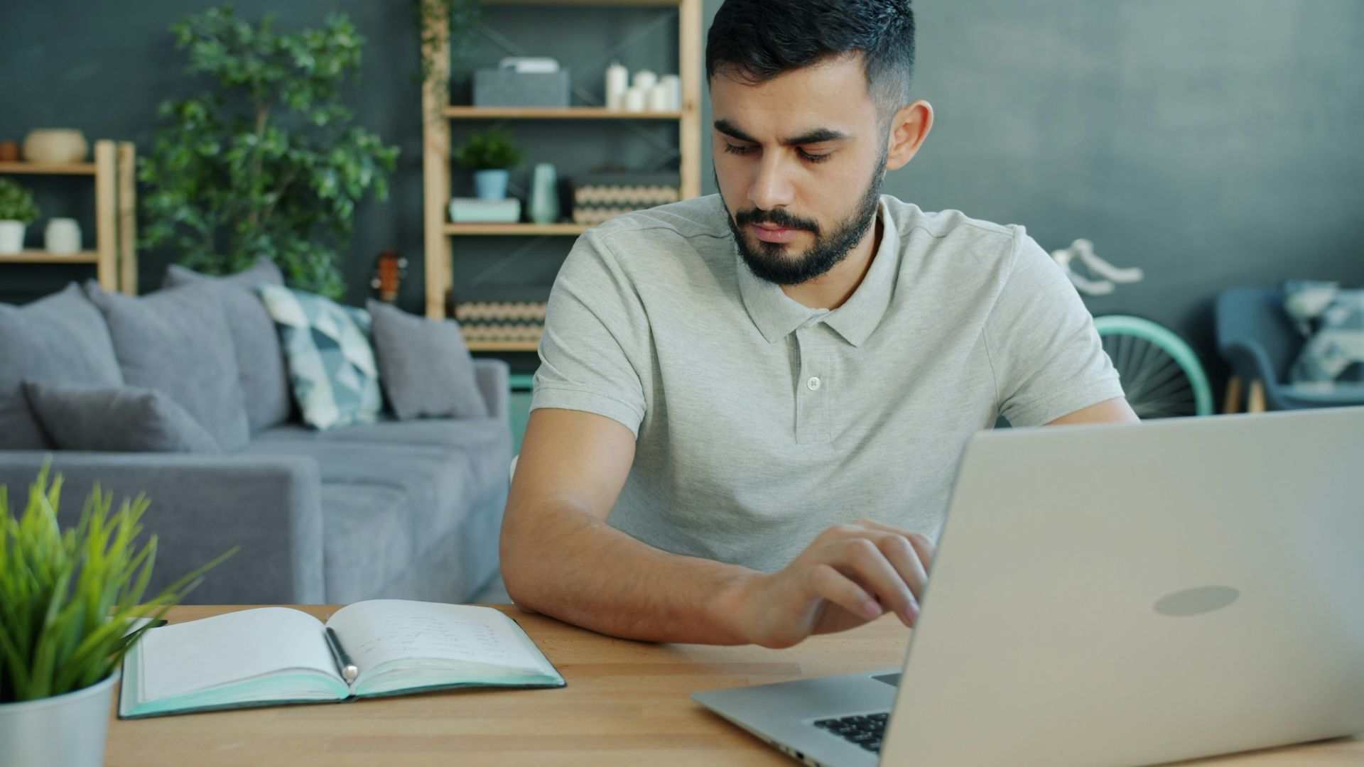 Man working on a laptop at a desk