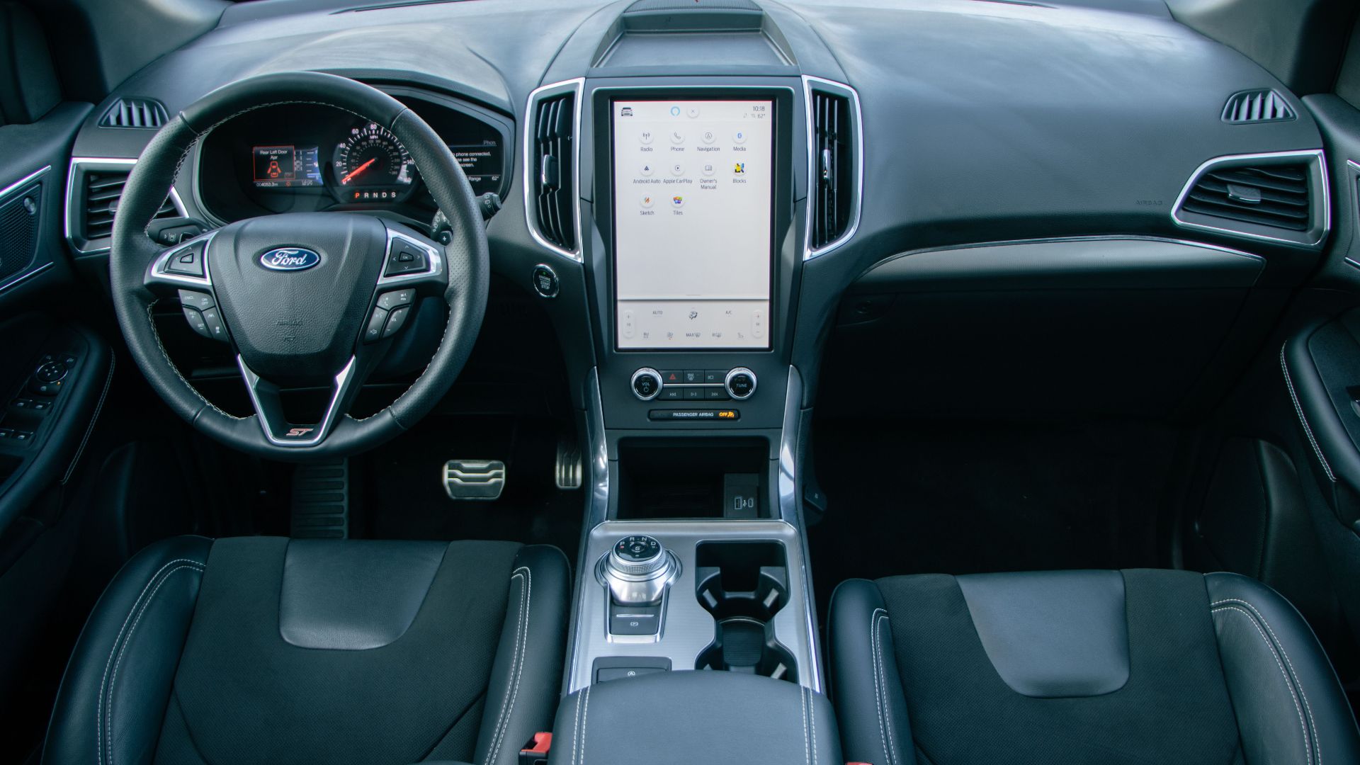 Modern Ford car interior showcasing the sleek dashboard and controls.