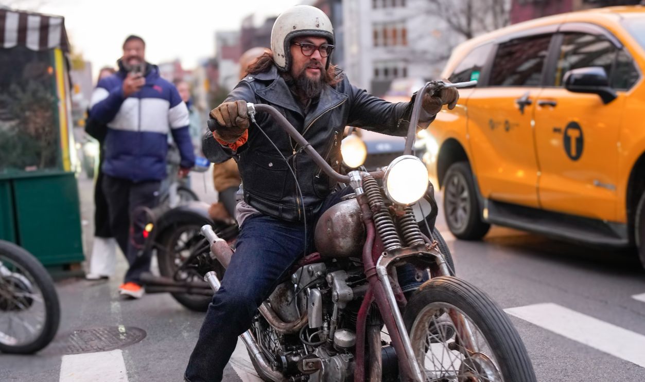 Jason Momoa rides a motorcycle on November 13, 2023 in New York City. 