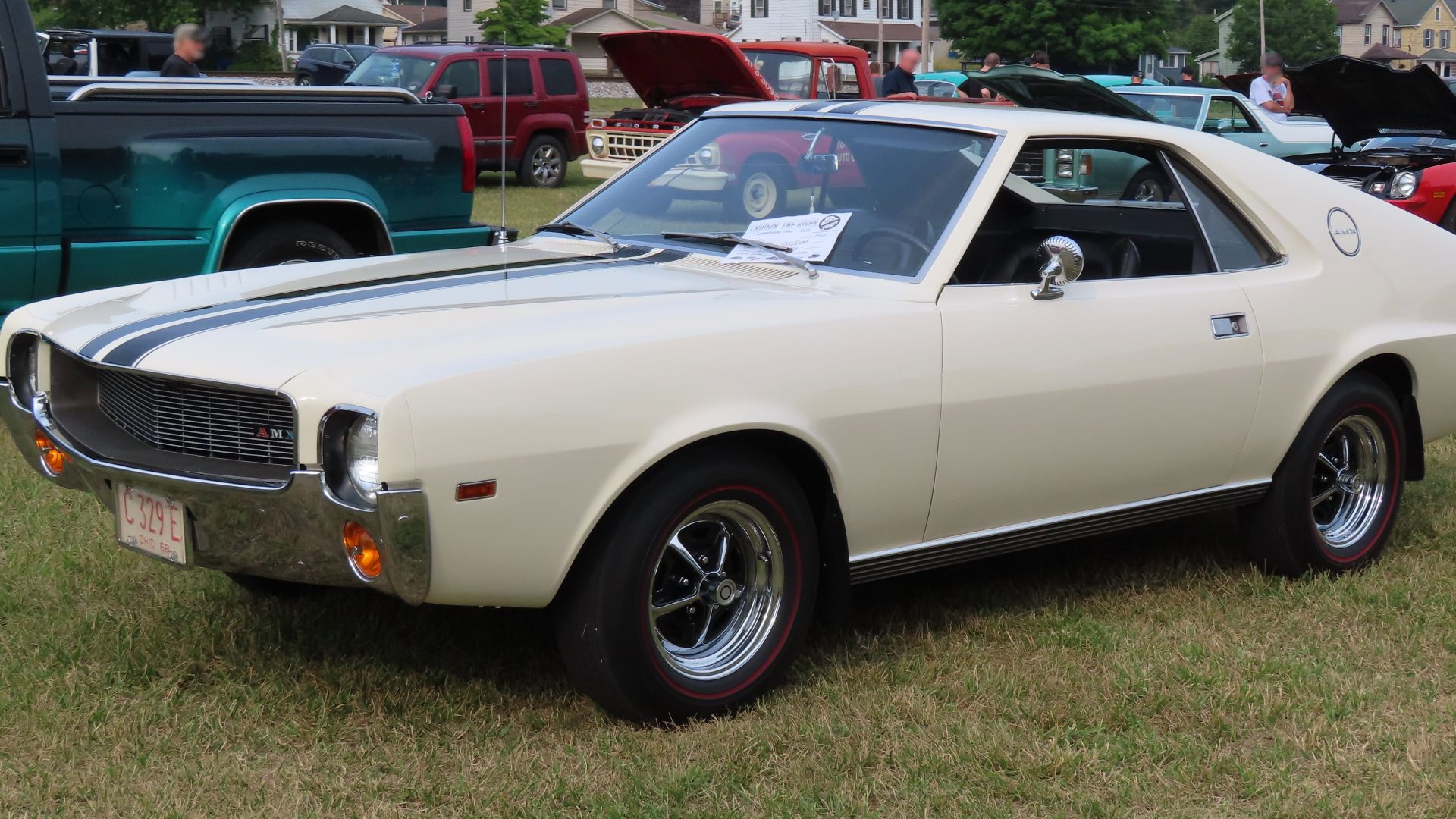 1968 AMC AMX 390 Go Package photographed at the June 19th, 2023 Cruisin' the River Lowellville Car Show in Lowellville, Ohio. Finished in Frost White.