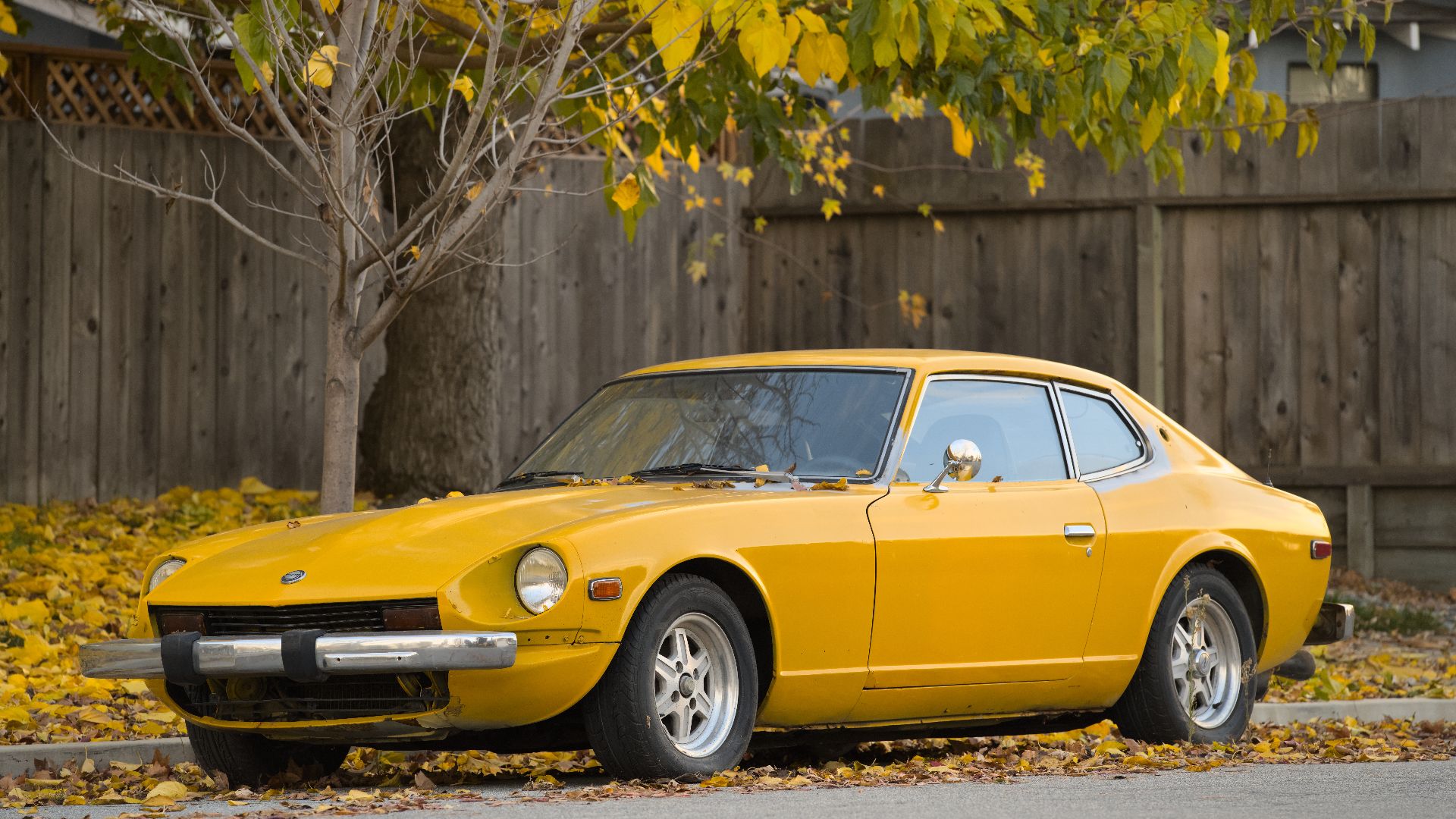 A yellow Datsun 240Z.