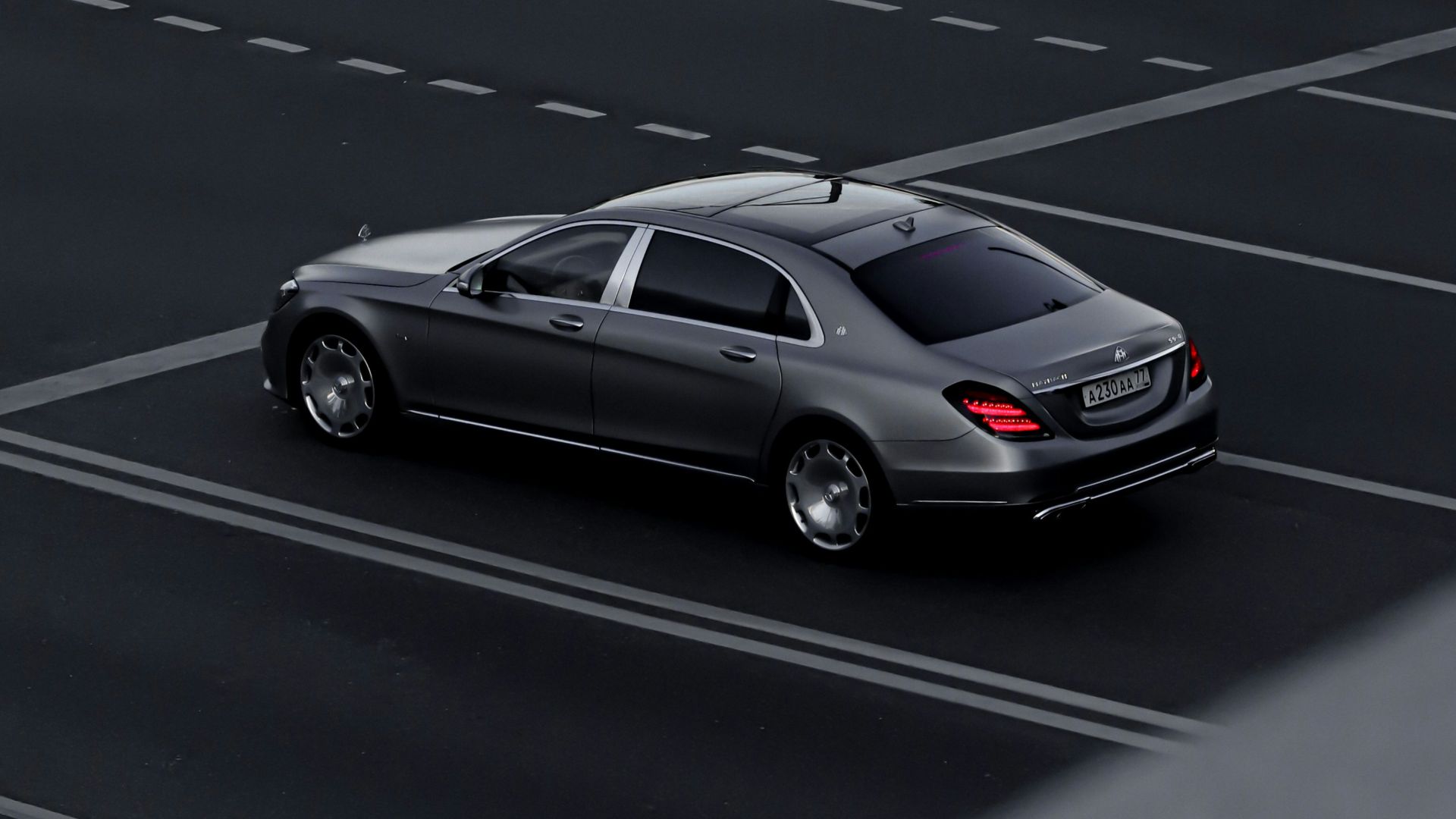 silver sedan on road during daytime