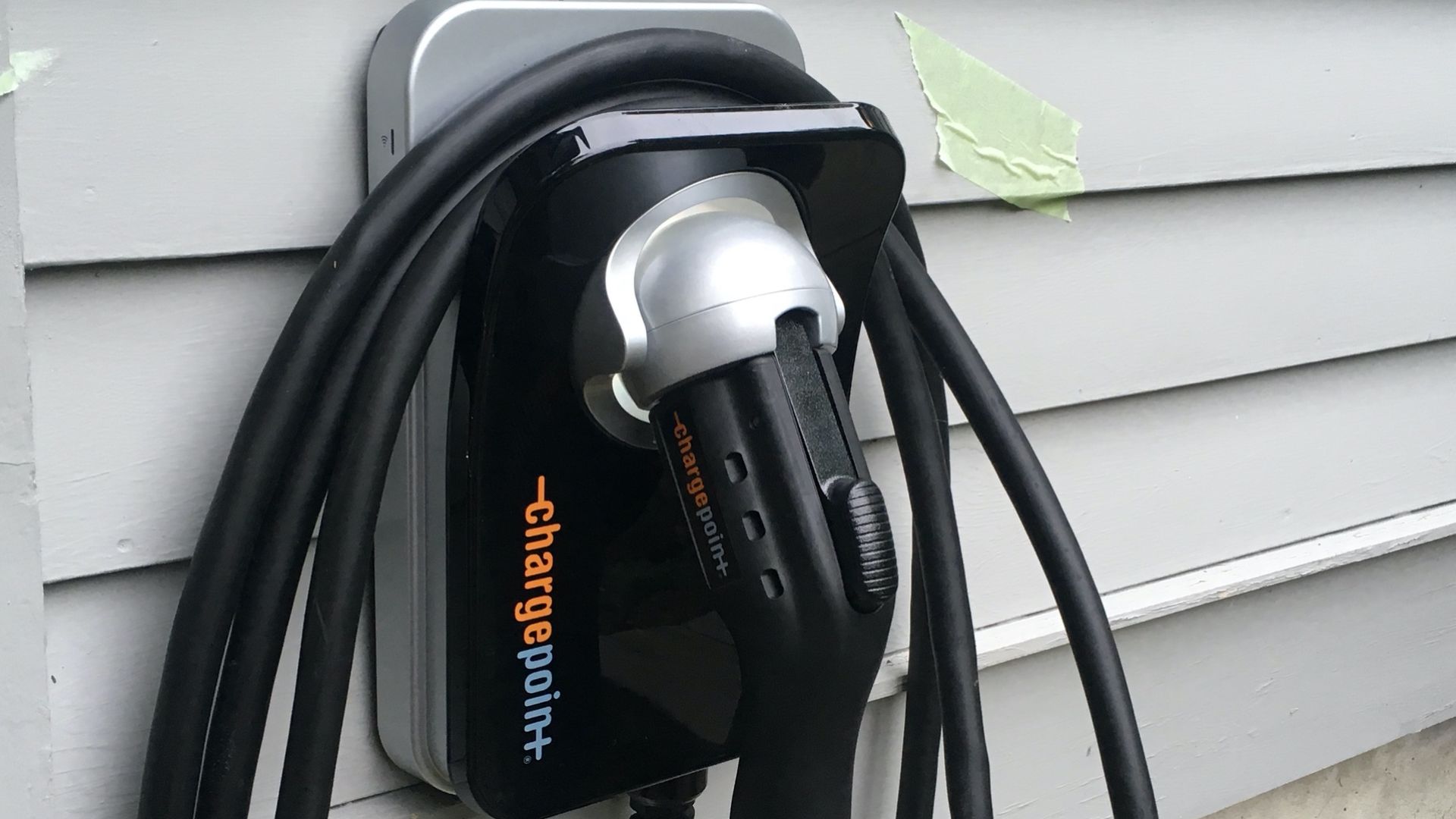 Home EV charging by ChargePoint in CT. The tape was used to cover the connection in to the house before the charger was actually installed.