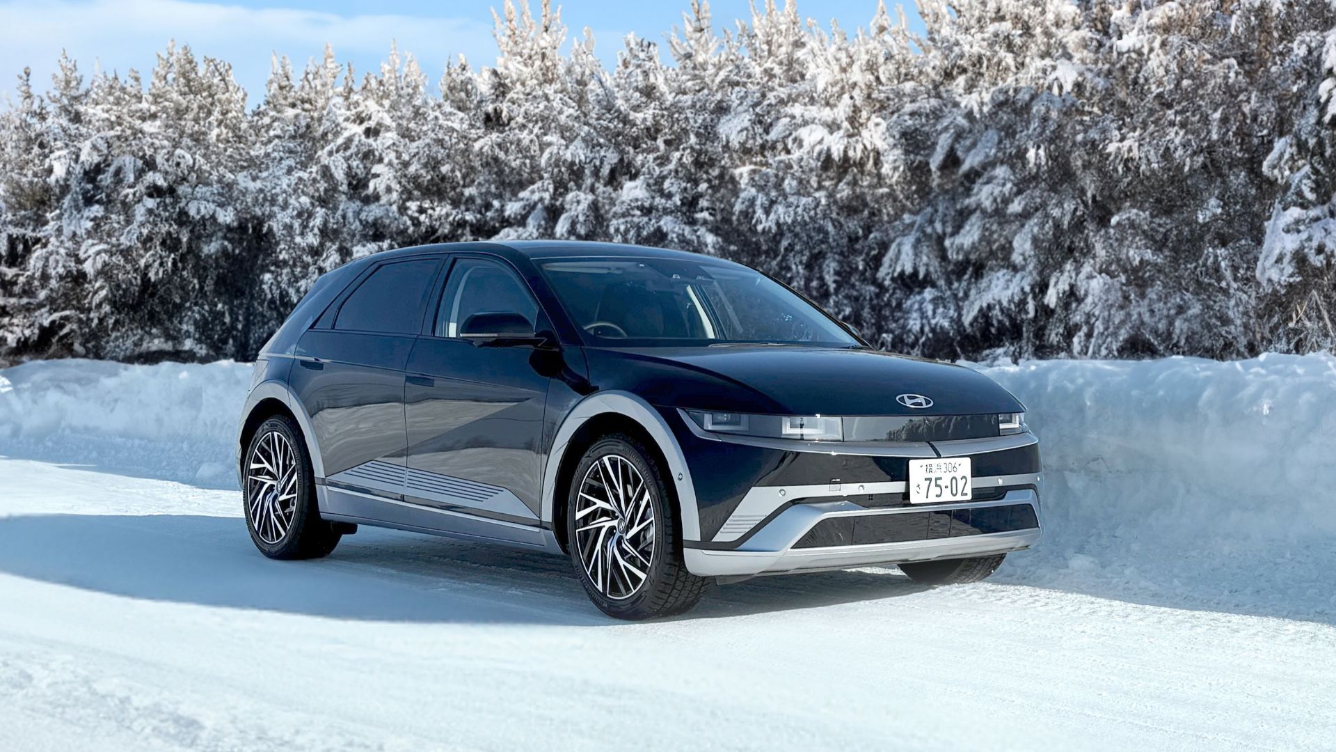 Hyundai Ioniq 5 electric car on a snowy road in Sapporo, Japan.