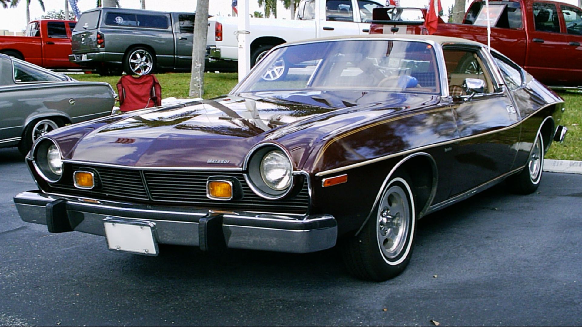 1976 AMC Matador Coupe - Brougham edition finished in Dark Cocoa Metallic (paint code -H4) with optional vinyl roof cover. Front left view.