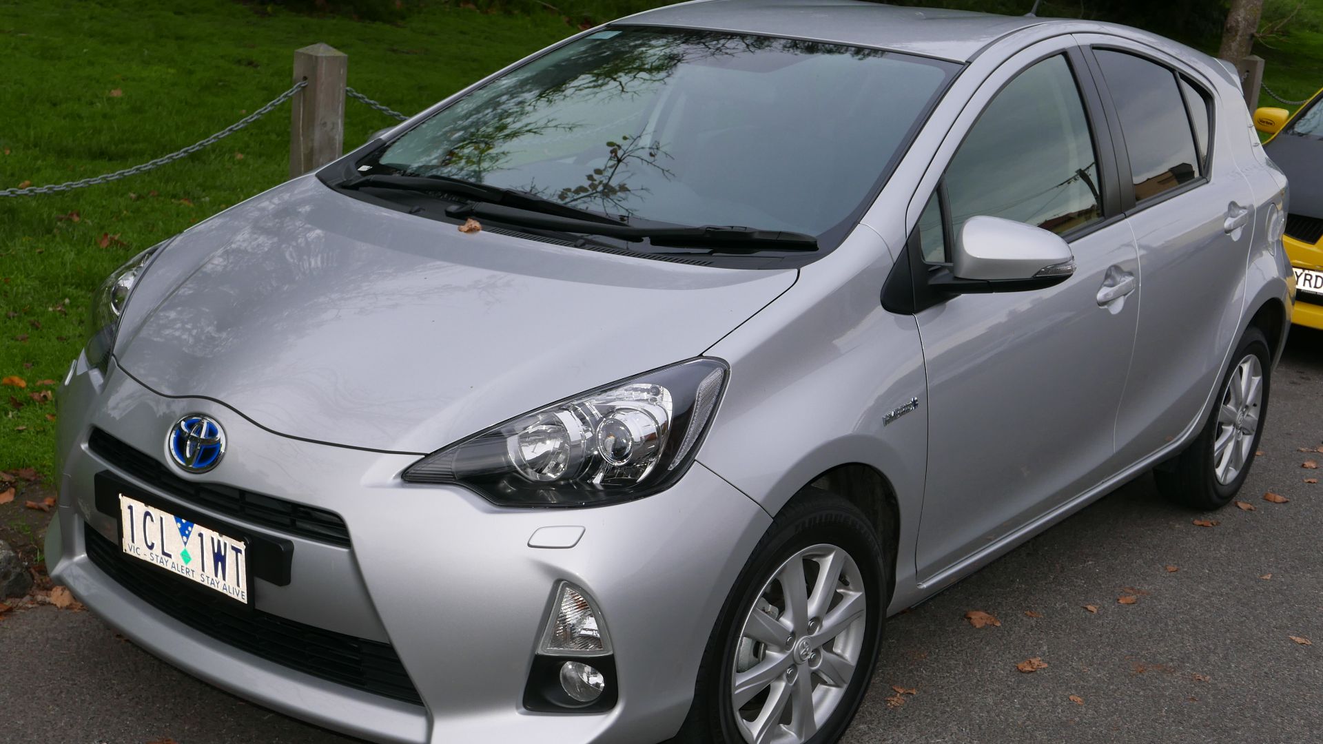2014 Toyota Prius c (NHP10R) i-Tech hatchback. Photographed in Fitzroy North, Victoria, Australia.