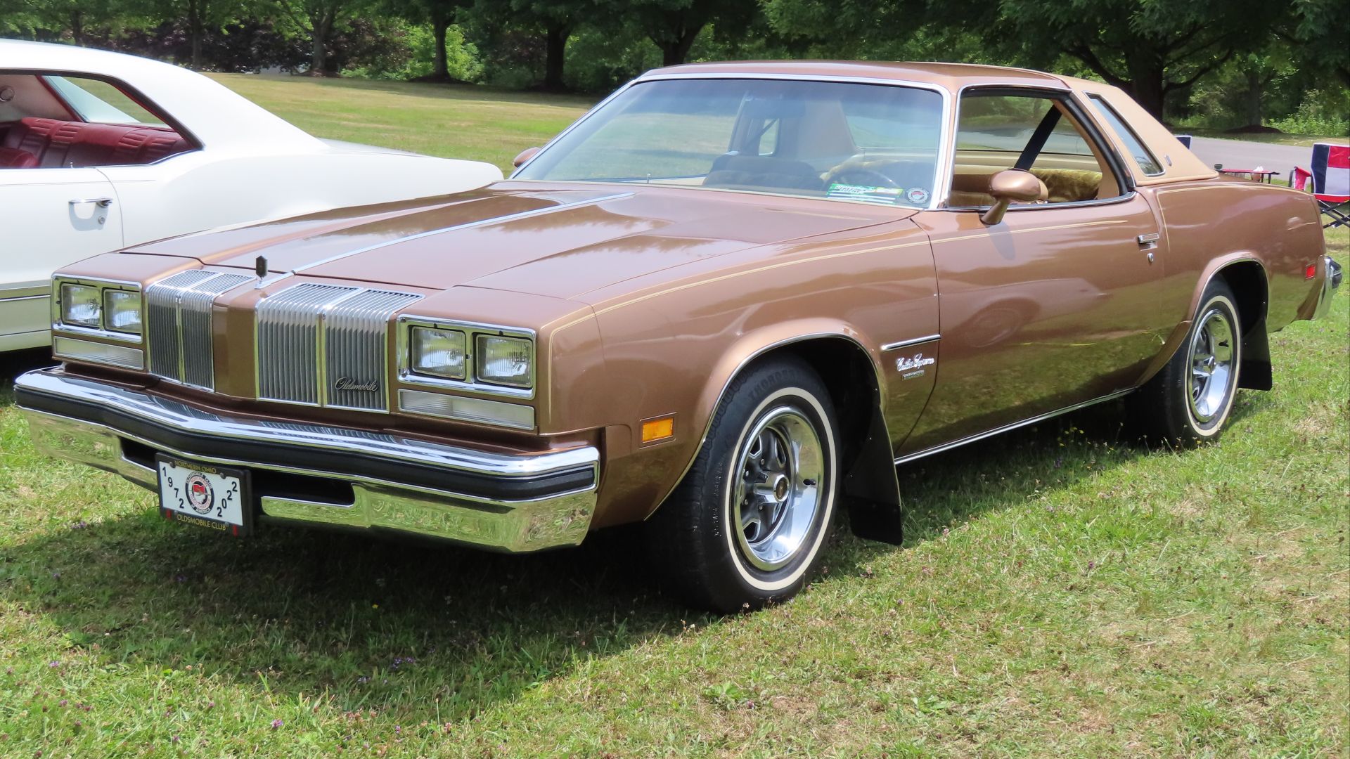 1976 Oldsmobile Cutlass Supreme Brougham coupe photographed at the 12th annual Street Scene Car & Custom Bike Show in Austintown, Ohio. Finished in Saddle Metallic.