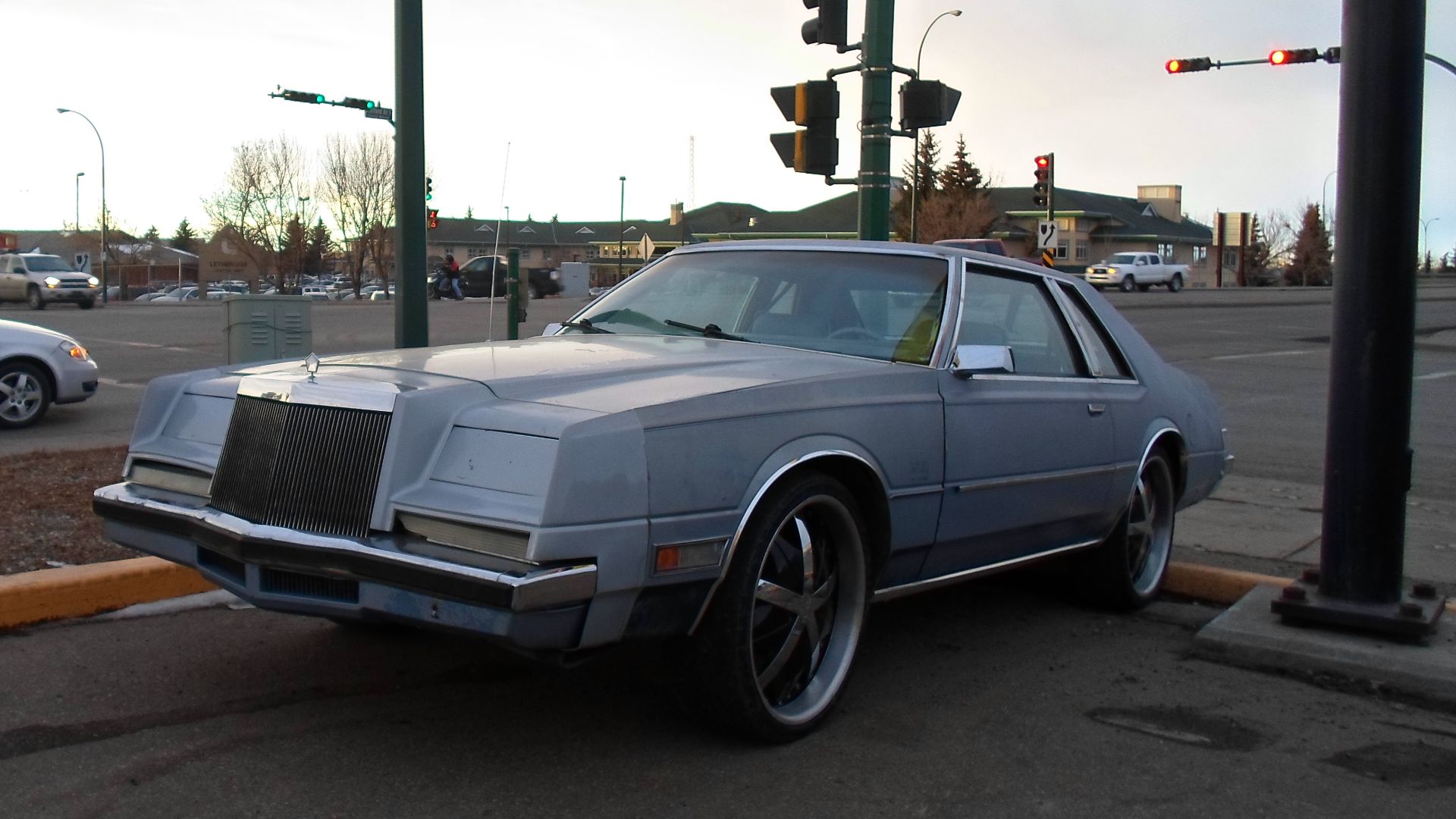 A rare to see 1981-1983 Imperial Coupe (Chrysler name not used but it did have a Chrysler Pentastar hood ornament) with rather large, bling wheels.