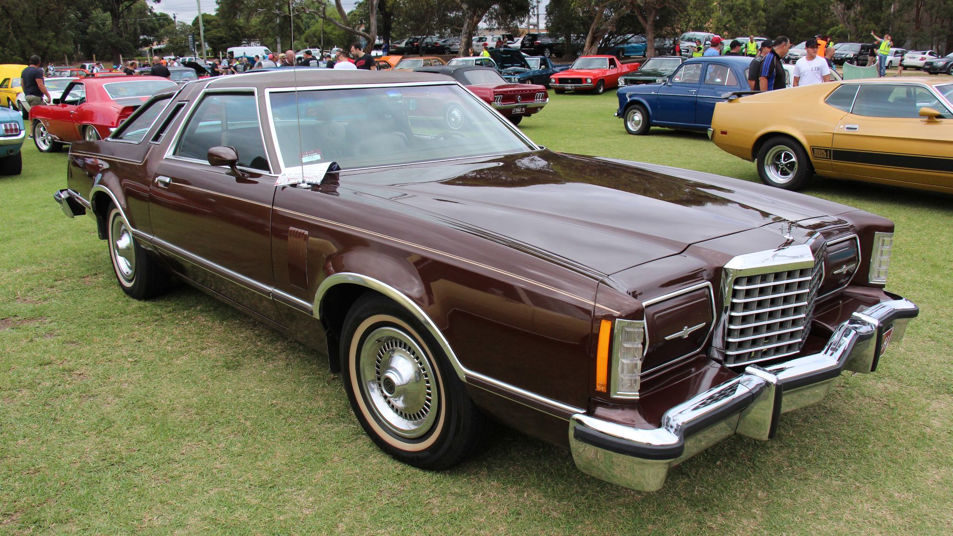 This is the 7th generation Thunderbird built from 1977-79, now based on the LTD II, it also now shared the squarer, sharper design with the Mercury Cougar. The Thunderbird was distinguished from the LTD II and Cougar 2 door models by its unique wrap-over 