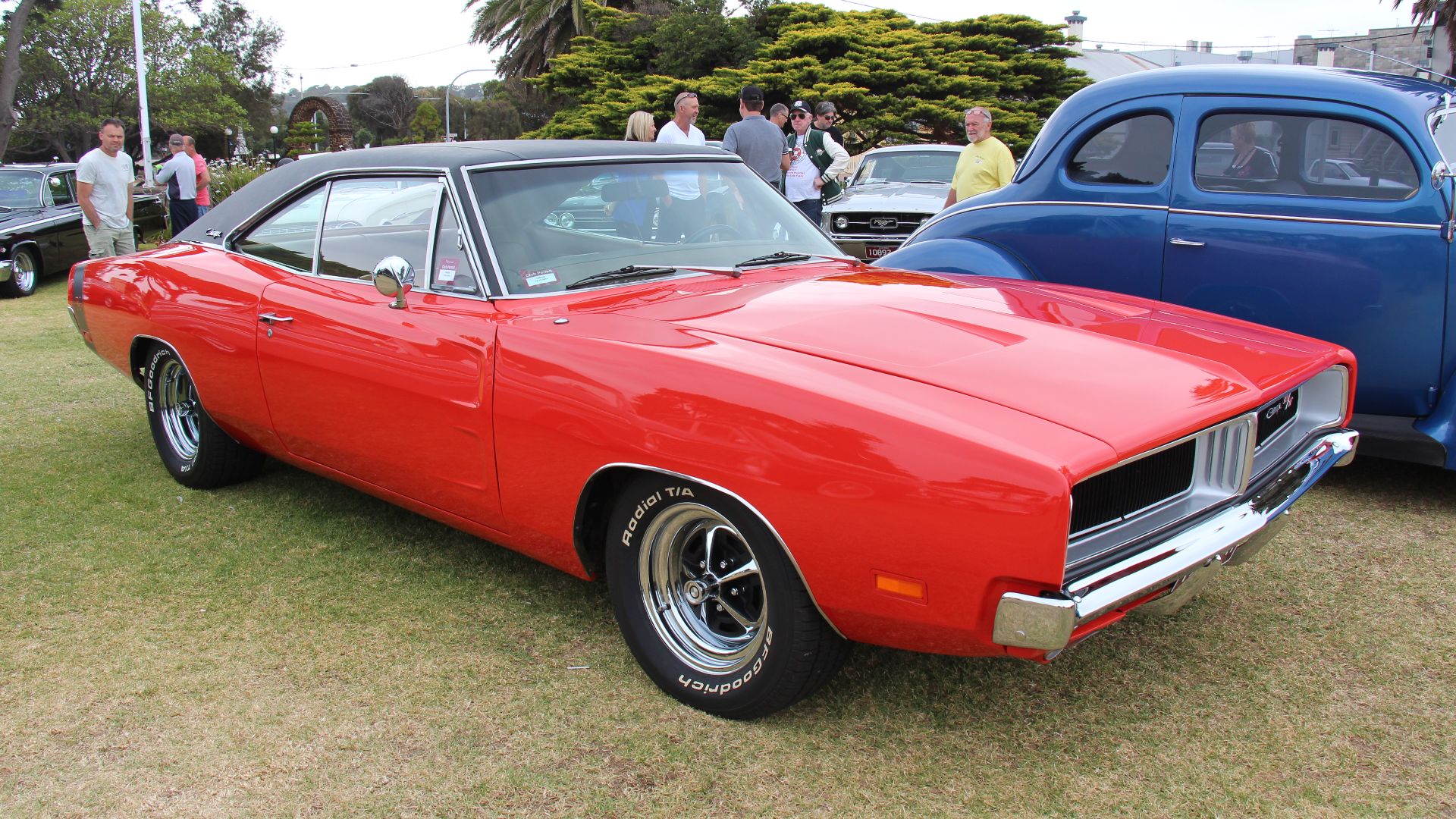 Charger Red.
From 1966 the B Body Dodge (same platform as the Plymouth Belvedere and Satellite) was available as the general Coronet or the 2 door muscle car, the Charger. It was redesigned in 1968 loosing the fastback styling and getting a 'coke bottle'