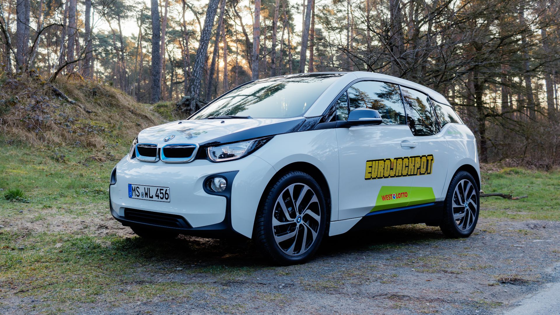 BMW i3 at sunrise at the Sandstraße in Hausdülmen, Dülmen, North Rhine-Westphalia, GermanyThe BMW i3 is a compact, premium-class, purely battery-powered electric vehicle that was introduced in 2013 and produced until 2022. Designed as an urban, sustainabl