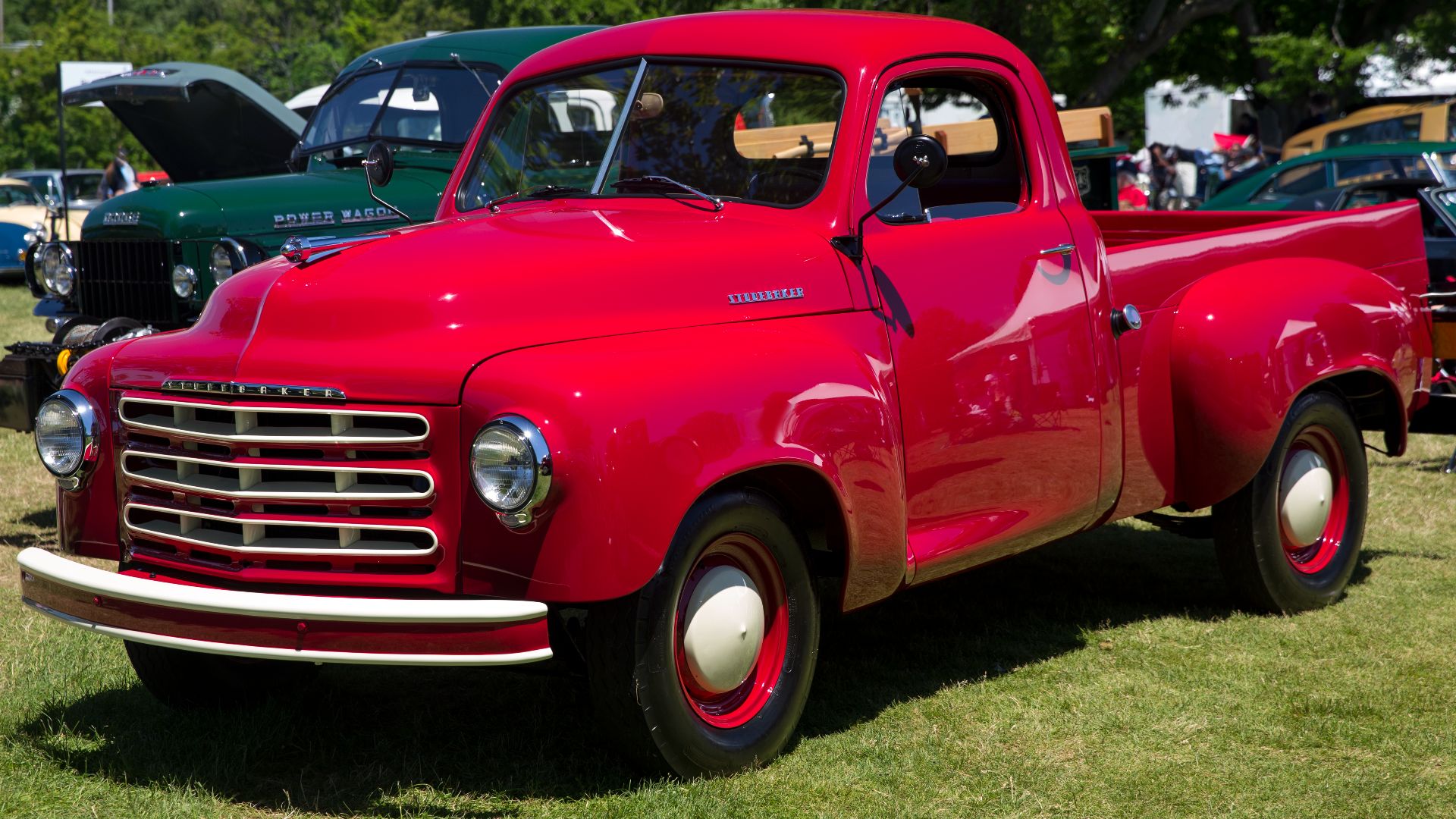 1953 Studebaker 2R5 half-ton truck in Cherokee Red at the 2022 Greenwich Concours d'Elegance. Second owner since new! Deluxe cab, including such sybaritic pleasures as heater, interior lights, and two outside mirrors.