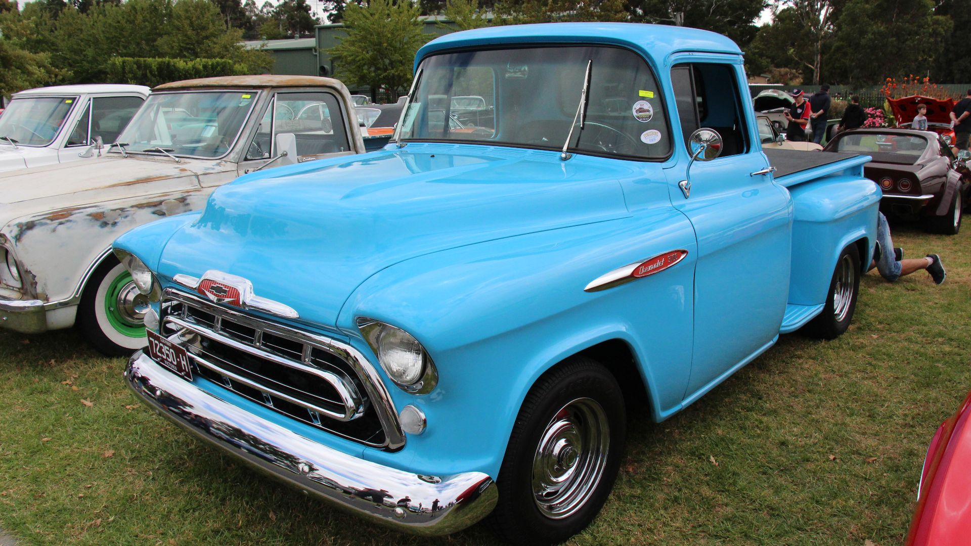 The Chevrolet Motor Company was formed in 1911. 
From 1955-59 the Chevy Pickups were known as the Task Force Series. 
1955; Wrap-around windshield, single headlights and one-piece emblem is mounted below horizontal line on fender. 
1956; wider hood emblem