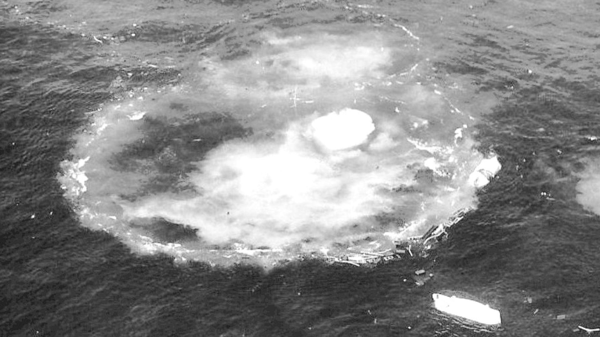 Photo of the Andrea Doria as it disappears beneath the waves off Nantucket Island, Massachusetts in 1956.