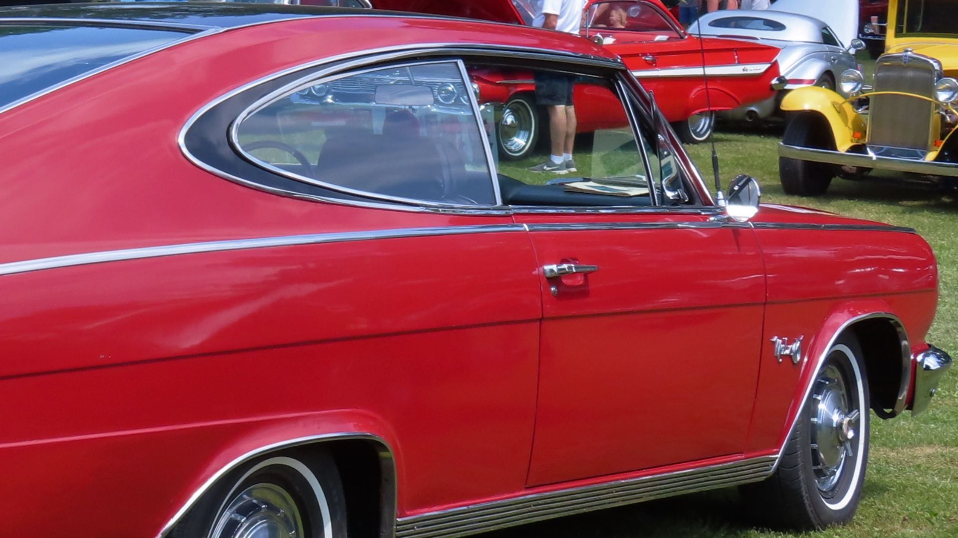 1965 Rambler Marlin photographed at the 2023 ARMCO Park Wheels of Steel Car Cruise in Slippery Rock, Pennsylvania. Finished in Antigua Red and Classic Black.
