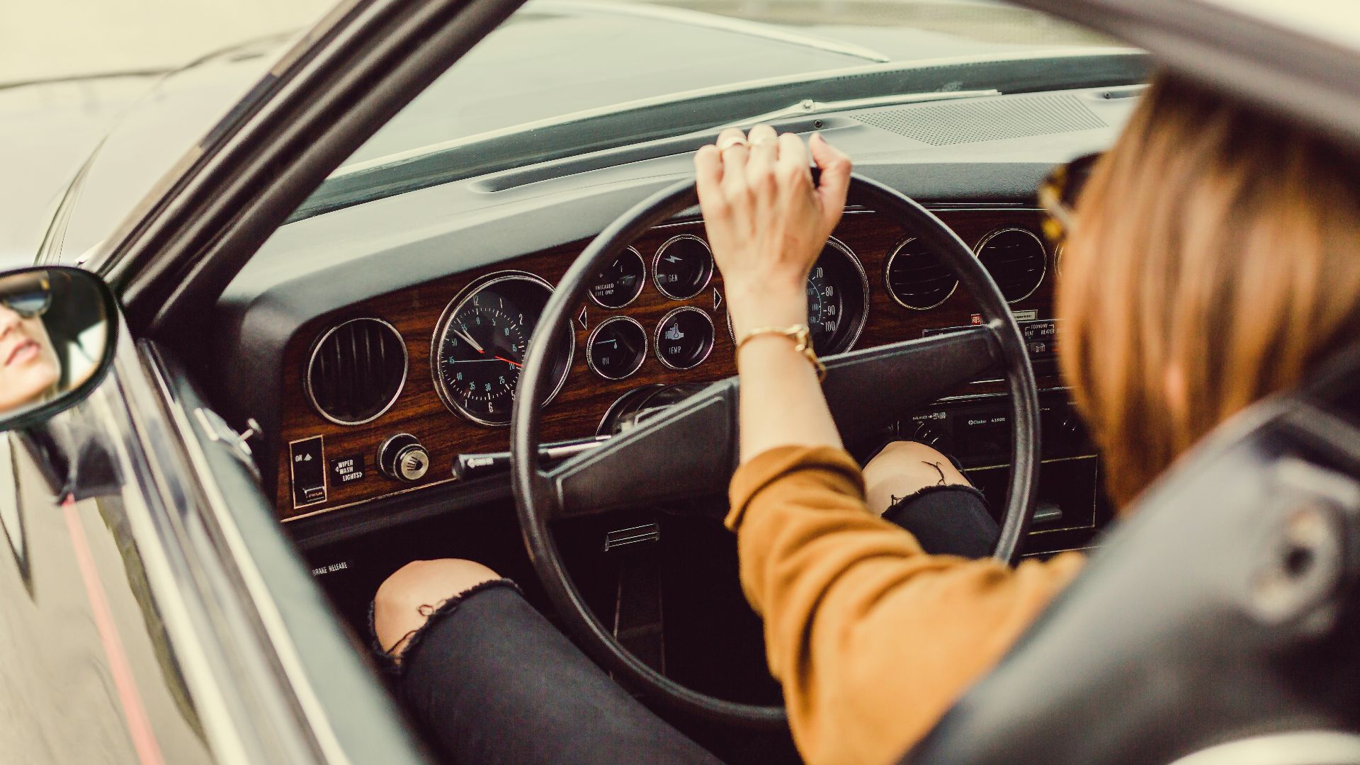 person sitting in the driver seat