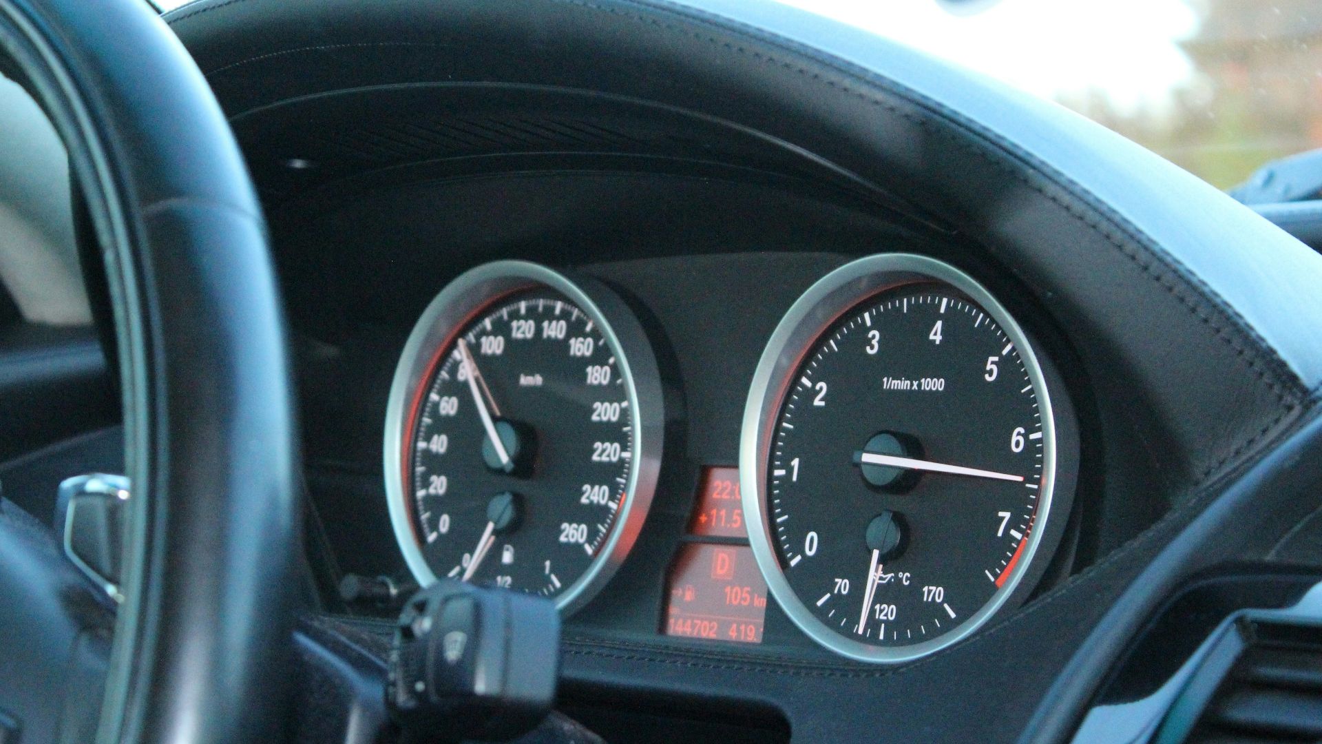 a close up of a speedometer in a car