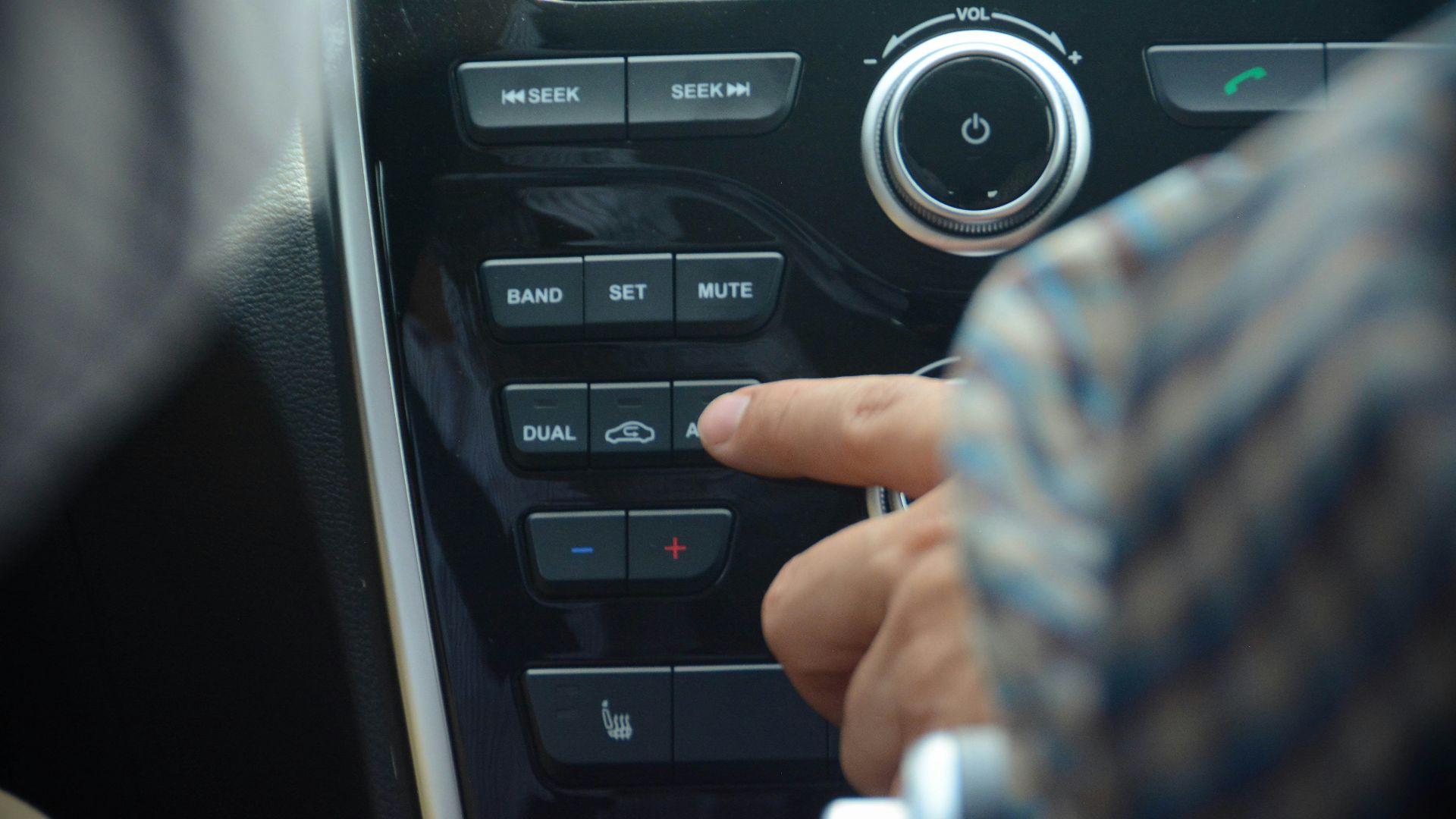 a person holding a remote control