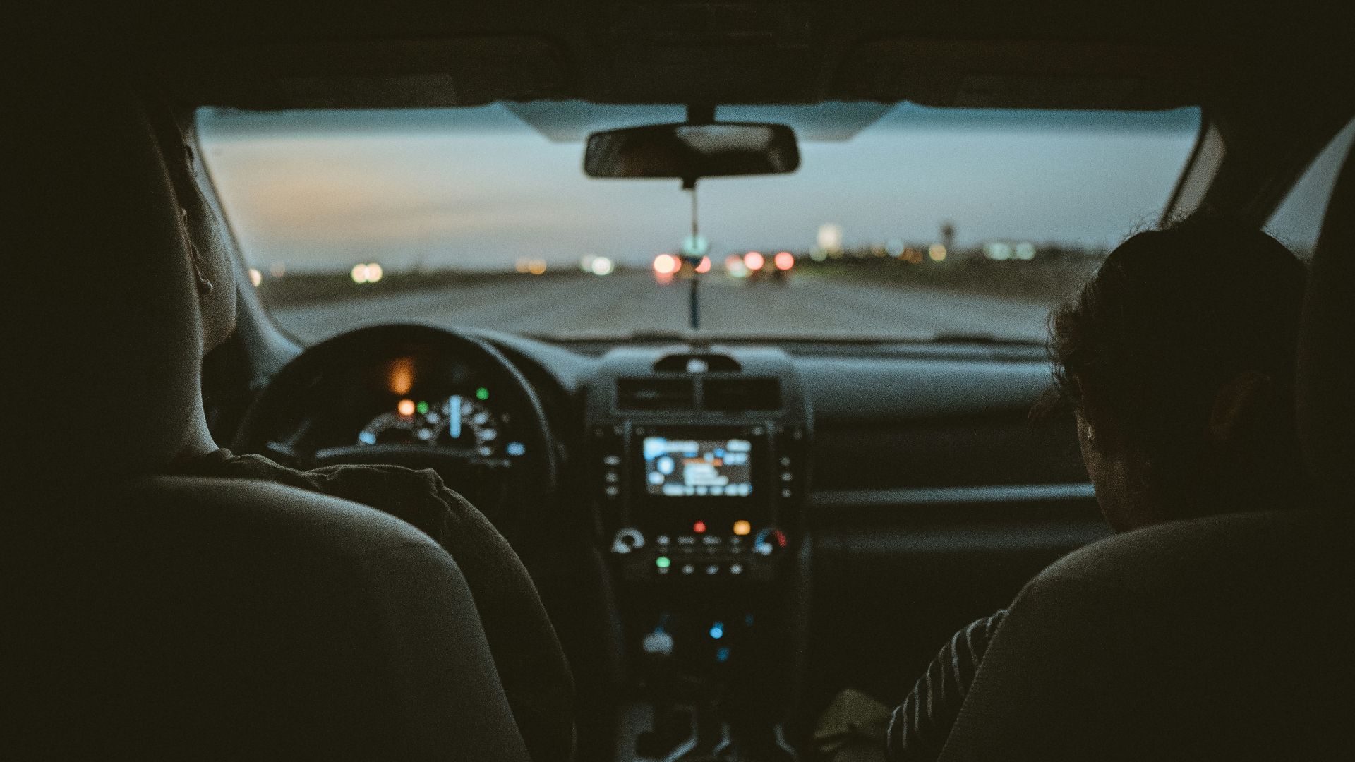 person driving car during night time
