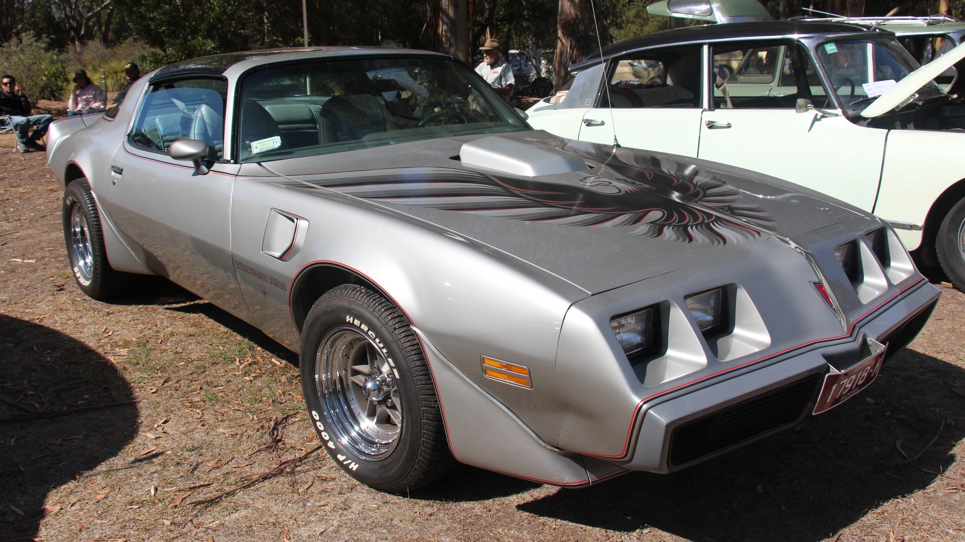 Silver.
GM created Pontiac in 1926, the Pontiac was built until 2010.
The Firebird pony car was introduced in 1967 to compete with Fords Mustang.
The 1970-81 second generation Firebird featured a more swoopy body replacing the coke bottle shape, no Conv