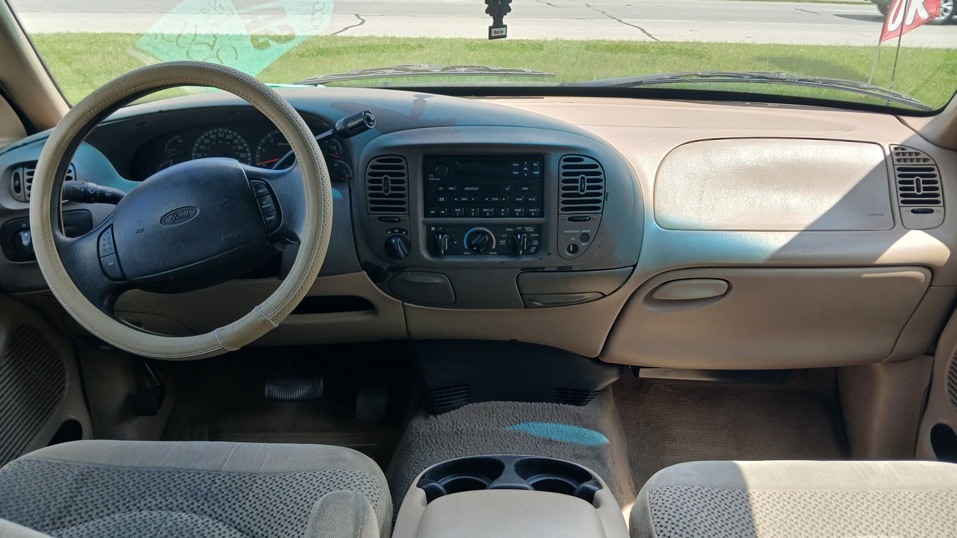 Dashboard of a 1999 Ford F-150 extended cab pickup truck.