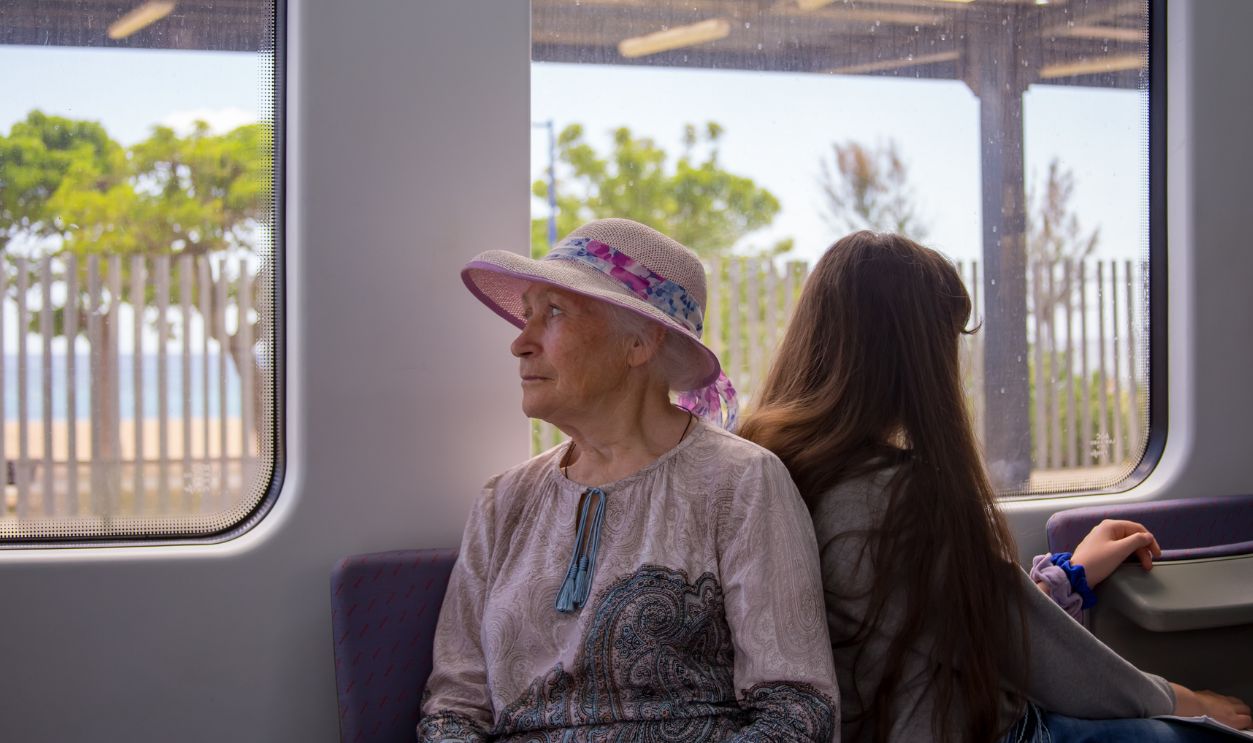 Senior woman on train journey