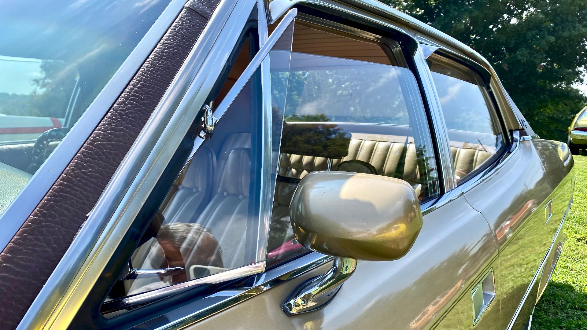 1972 AMC Ambassador Brougham four-door sedan. A full-size premium car built by American Motors Corporation (AMC). All had standard features that included a V8 engine, automatic transmission, and air conditioning. This car is finished in Yuca Tan Metallic