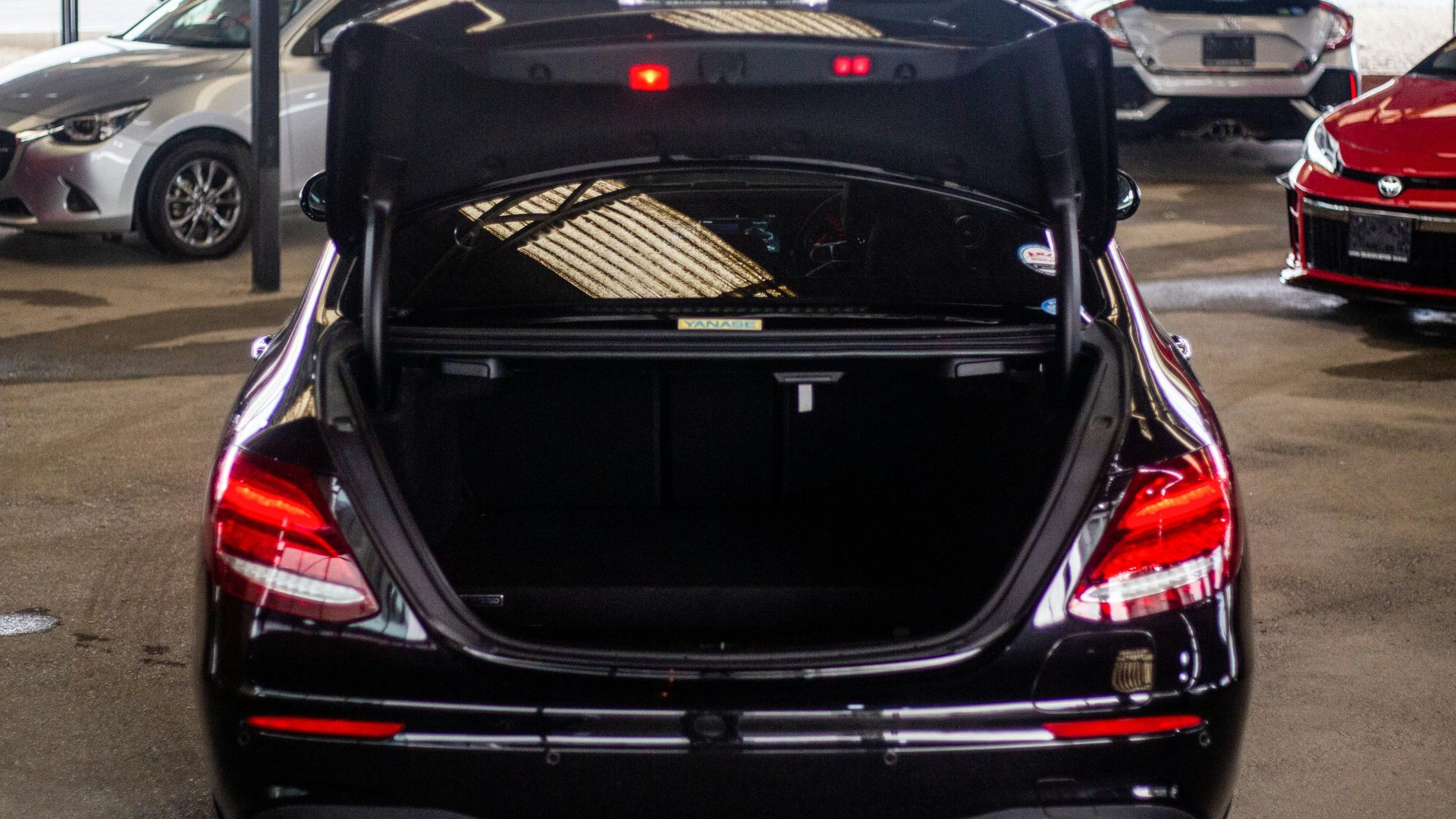 the back end of a car with its trunk open