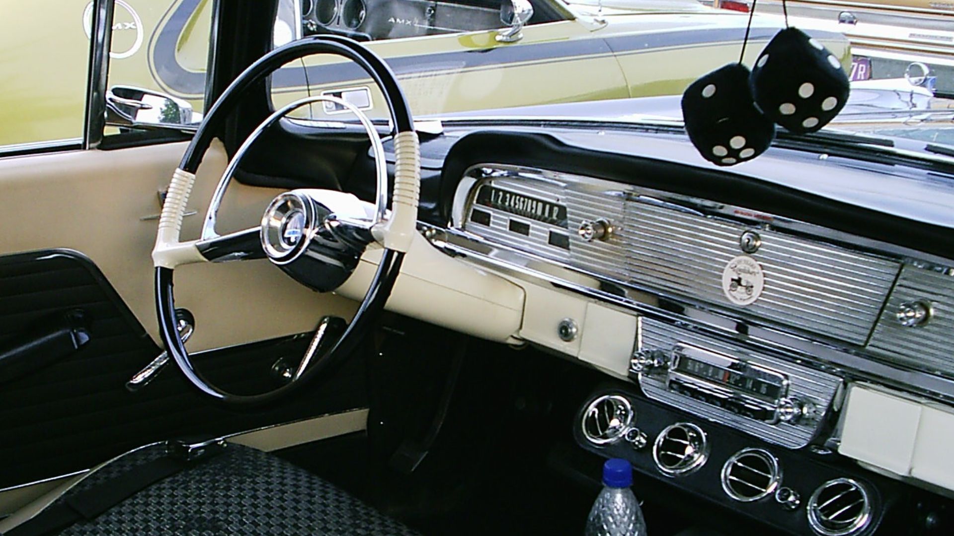 American Motors Corporation (AMC) vehicle - 1958 Ambassador by Rambler - 4-door hardtop body style - interior view of dashboard, steering wheel, and instrument panel. Picture taken at the AMCRC show in Gaithersburg, Maryland. During a