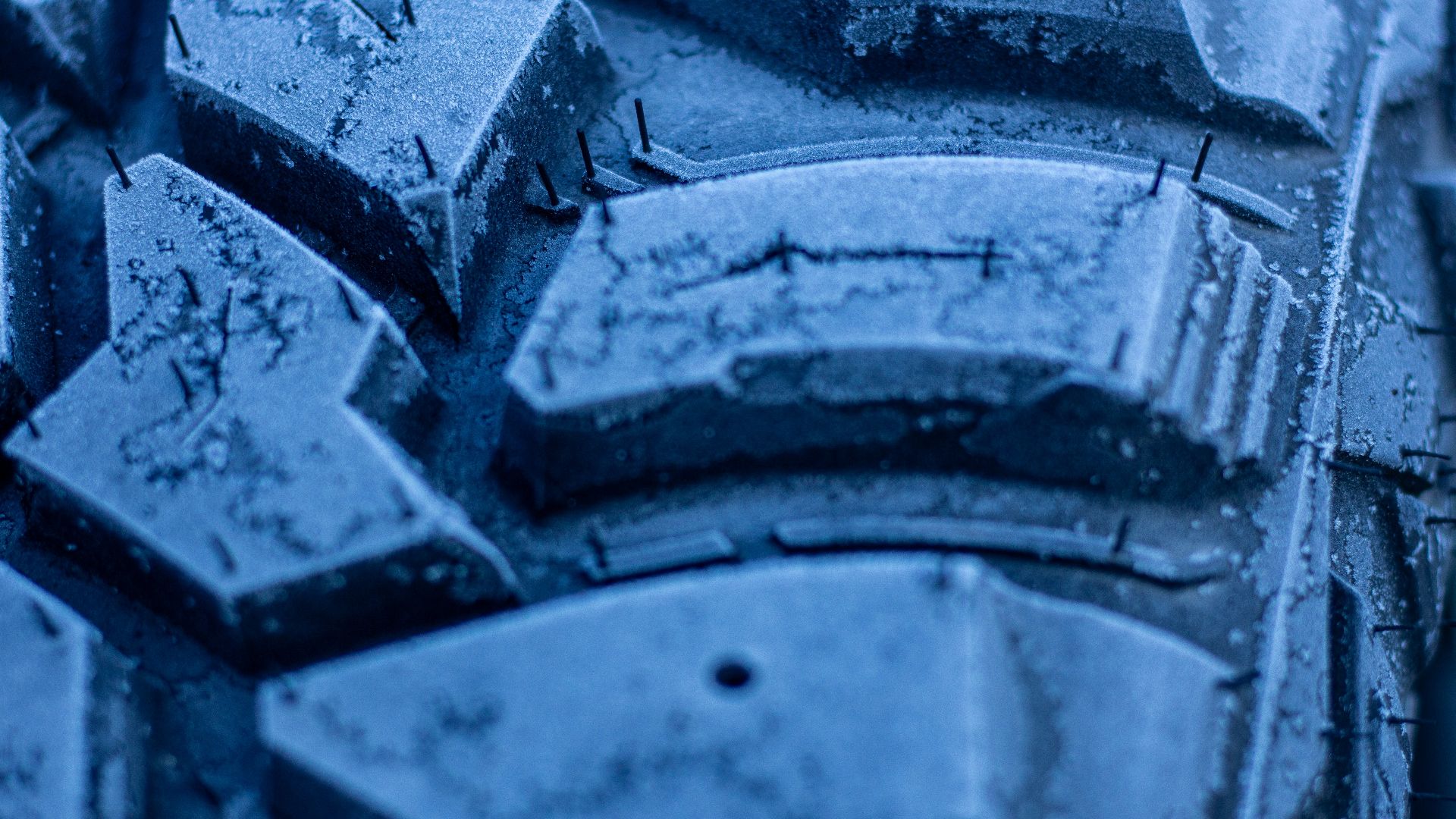 a close up of a tire with snow on it