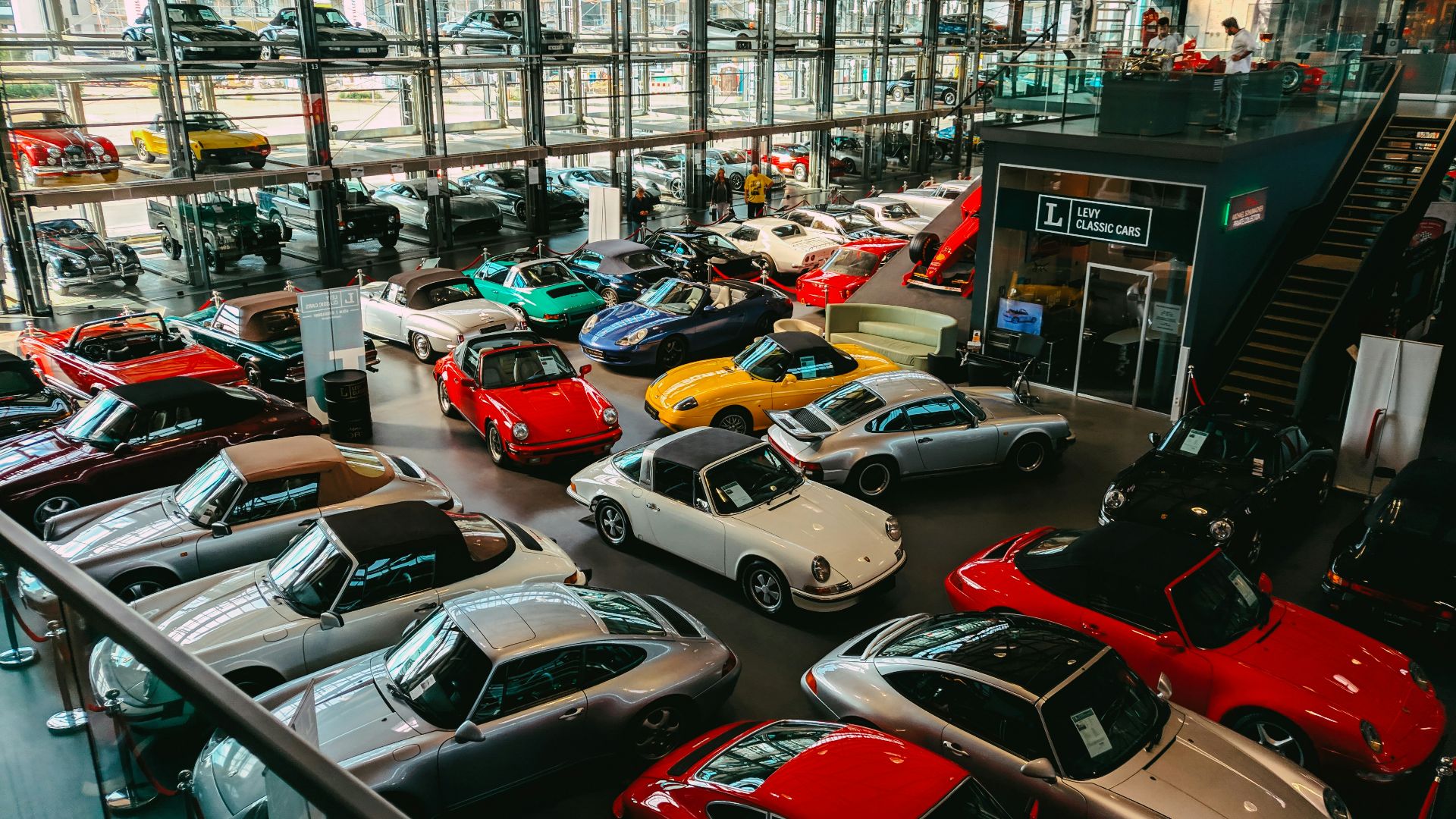cars parked in front of building during daytime
