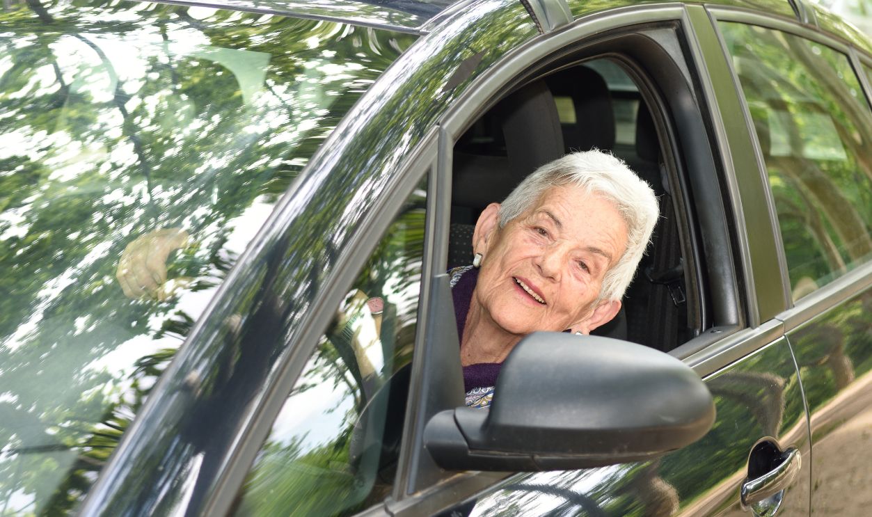 senior woman driving a car