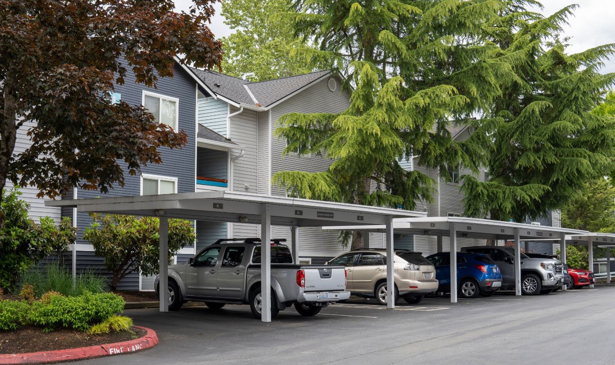 Everett, WA, USA - 25 May 2024. Typical american apartments building with covered parking 