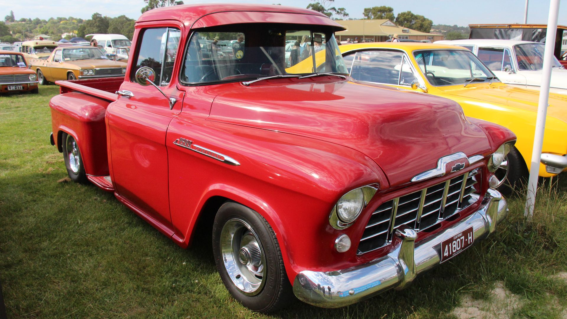The Chevrolet Motor Company was formed in 1911.
From 1955-59 the Chevy Pickups were known as the Task Force Series.
1955; Wrap-around windshield, single headlights and one-piece emblem is mounted below horizontal line on fender.
1956; wider hood emblem