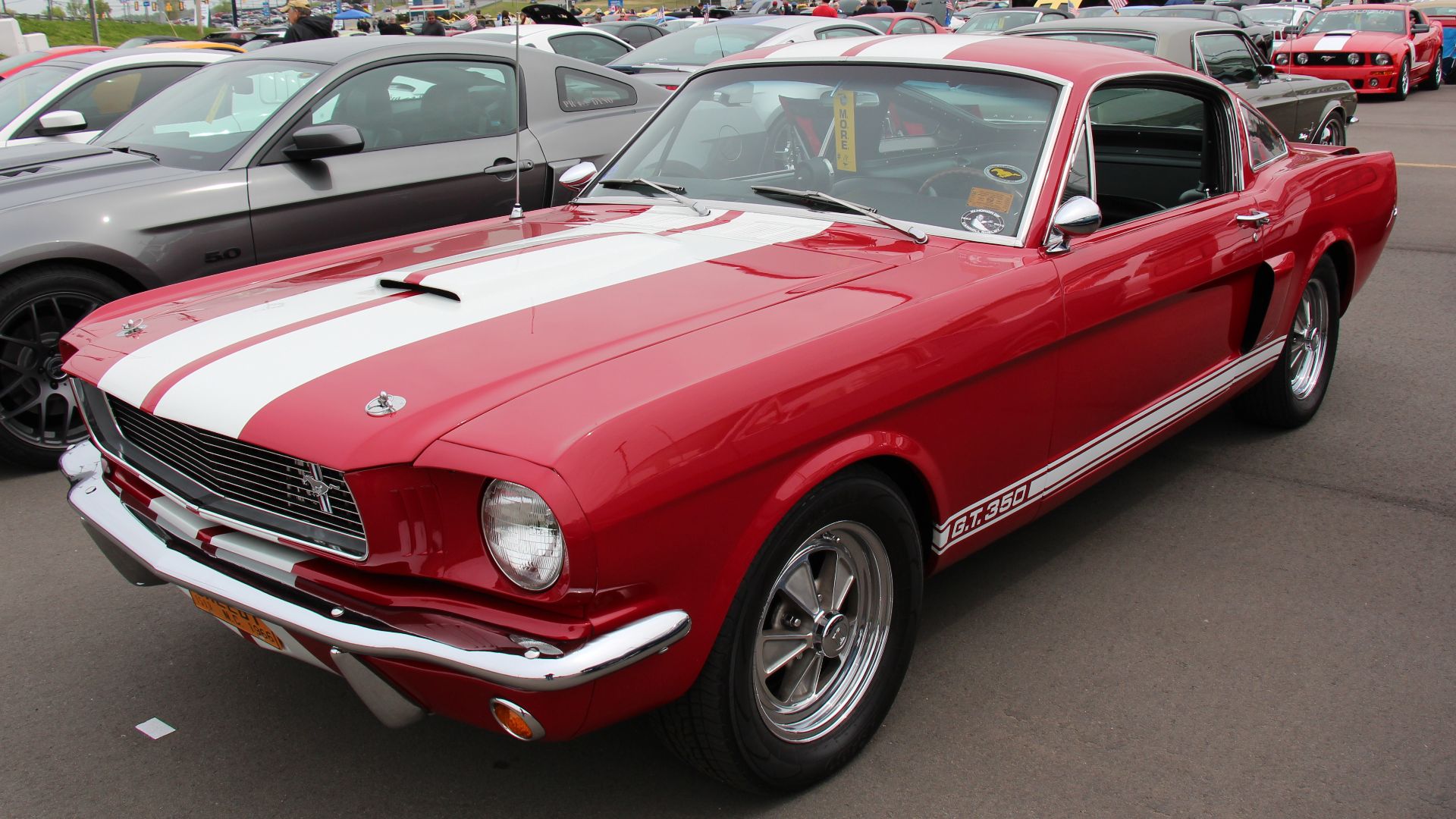 Candyapple Red.
The Shelby Mustang was a high performance version of the Ford Mustang which were built by Shelby America from 1965-1970. Engine; all 1965-66 Shelby Mustangs had the 306 bhp K Code 289 V8 with high riser manifold.
The 1966 car was a littl