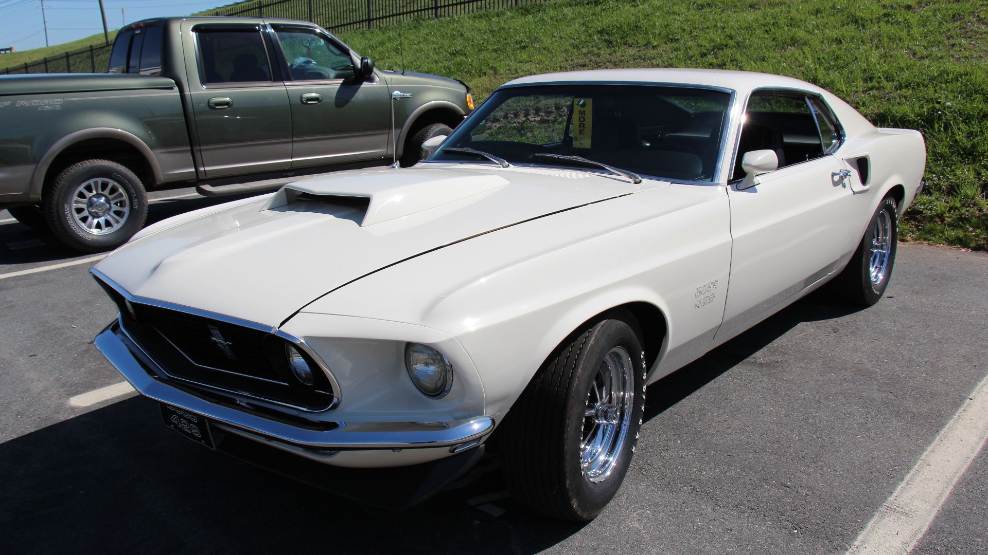 Wimbledon White. 
The 1969 Mustang got a new body, nearly 4 inches longer than the 1968 model. The Fastback was now called the Sportsroof. 
The Boss 429 was born of Ford's need to qualify 500 examples of its new racing engine for NASCAR. But instead of pu