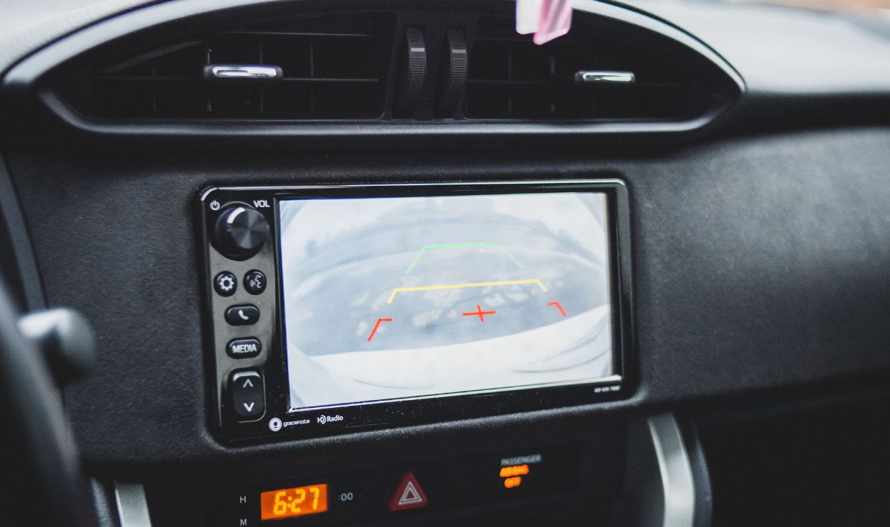 Close-up of a car dashboard featuring a touchscreen display