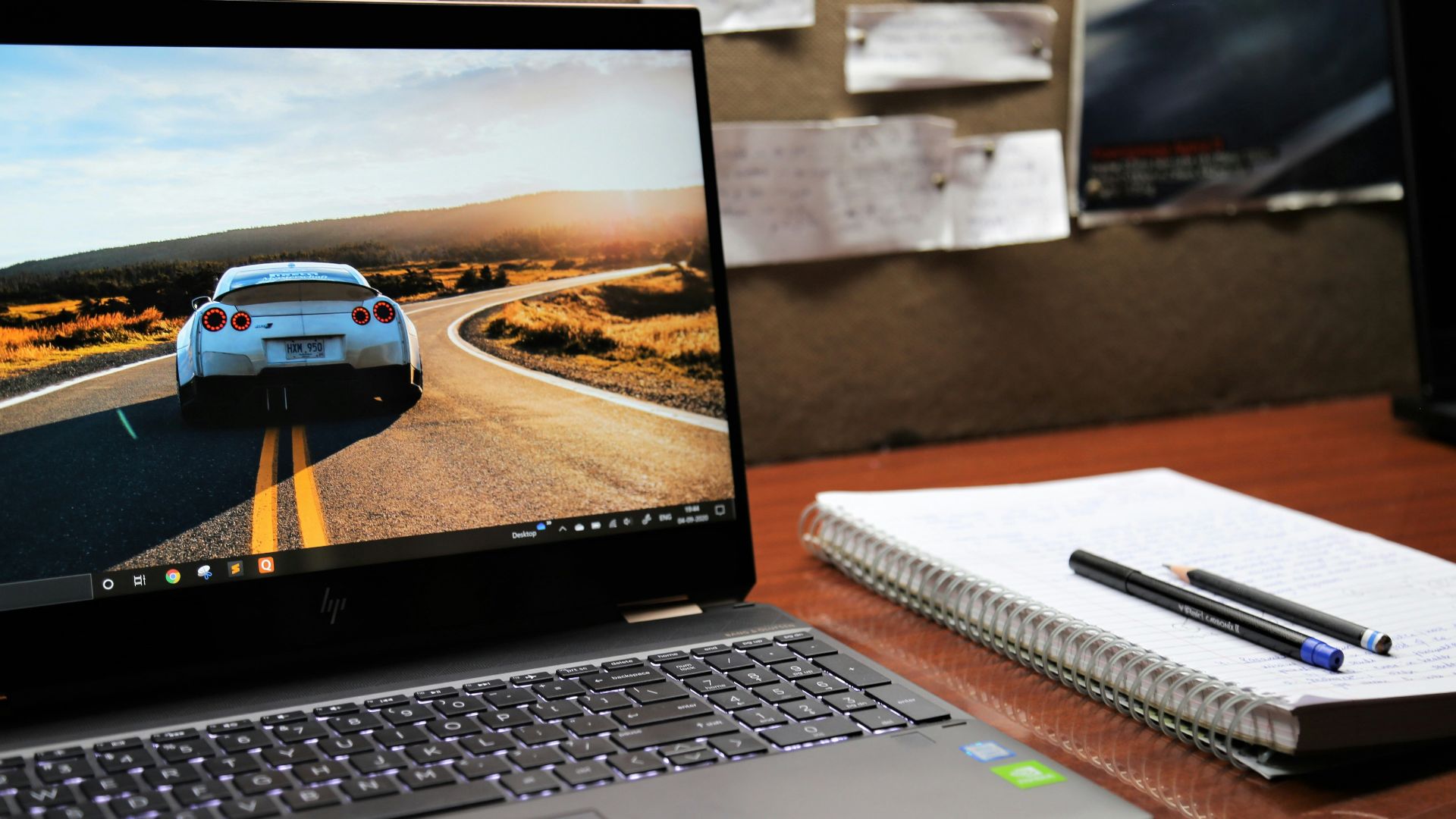 macbook pro on brown wooden table